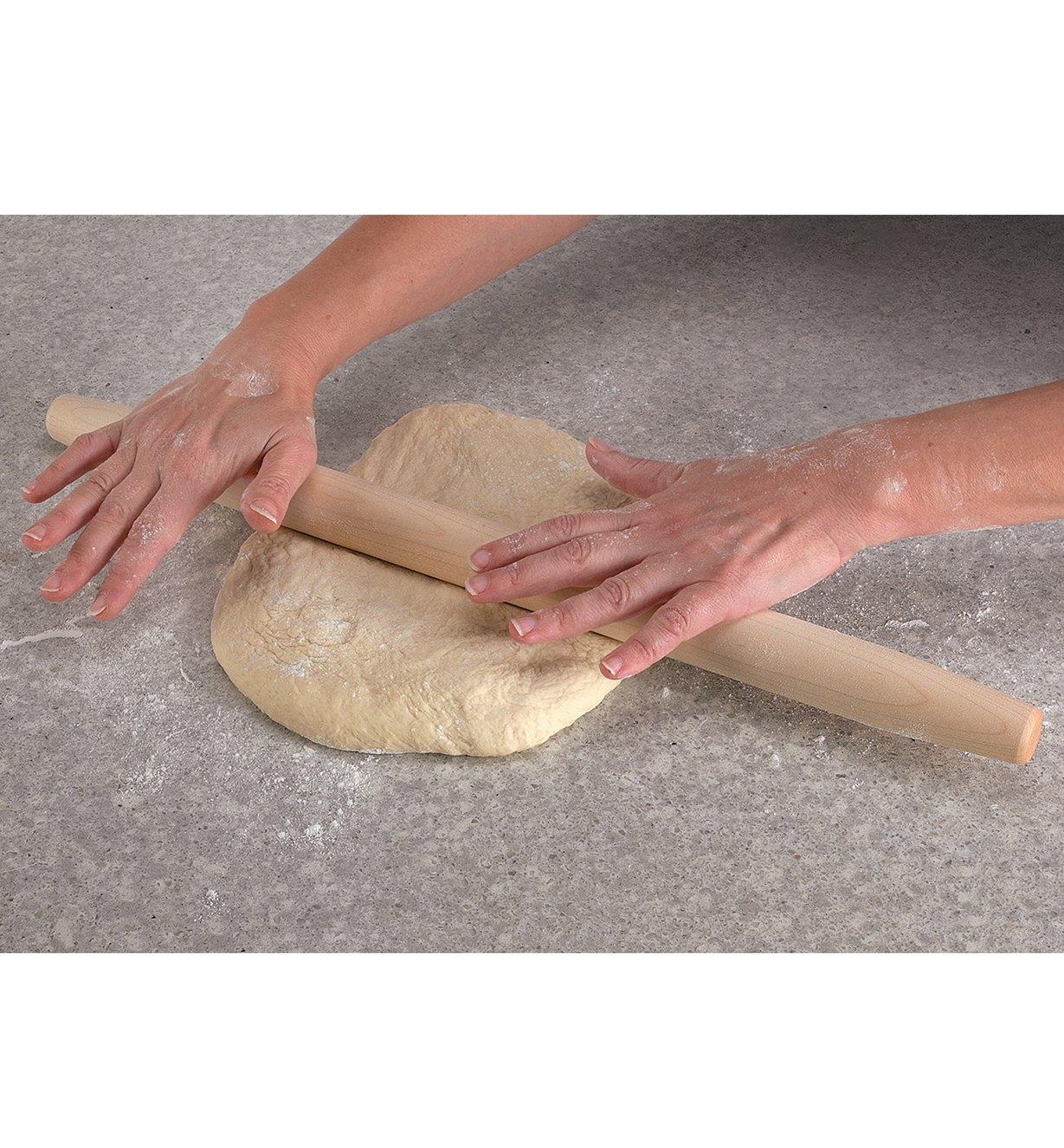 Using the French-Style Rolling Pin to roll out dough