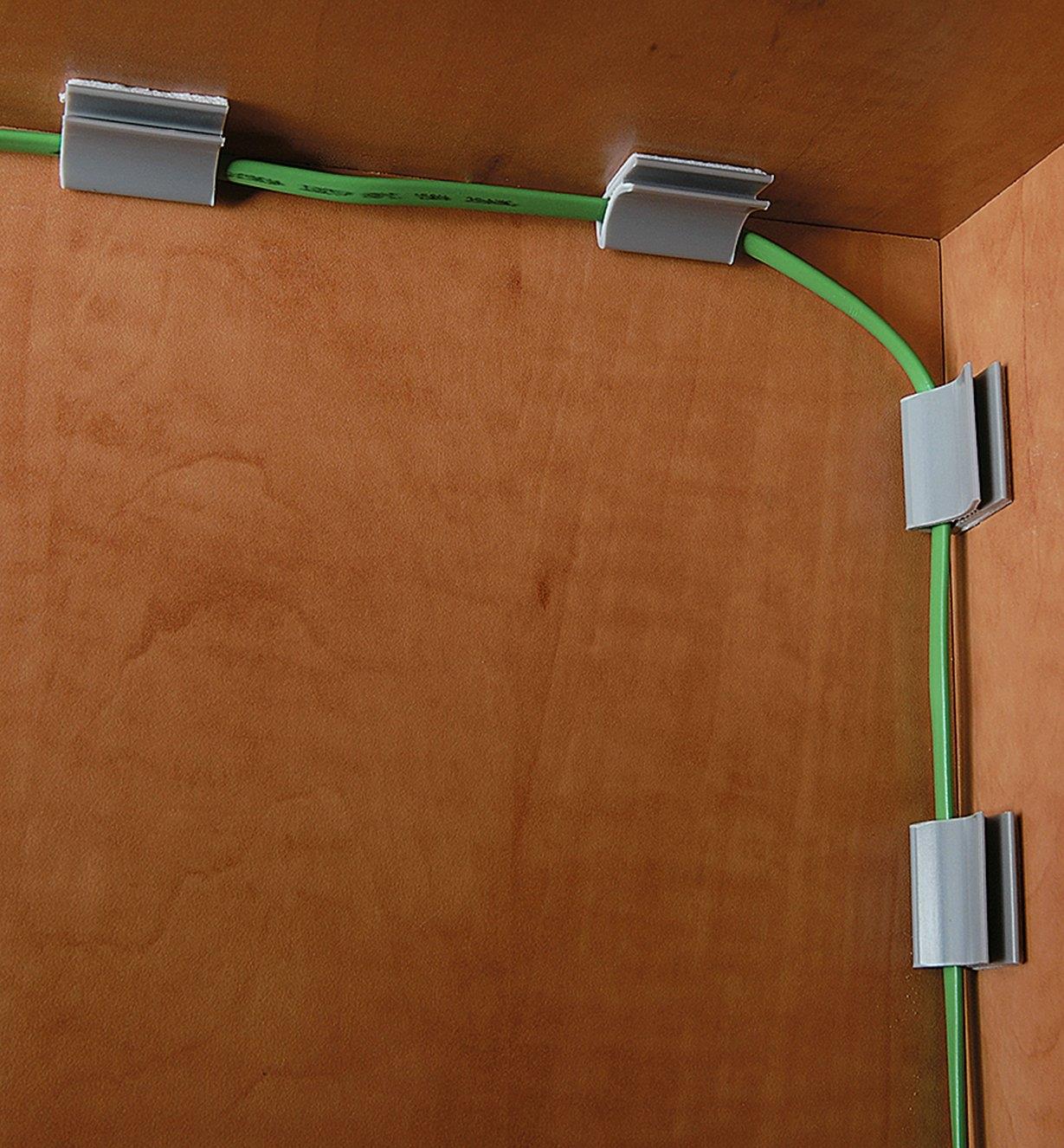 Flat Cable Clamps used to attach cable to the inside of a cabinet