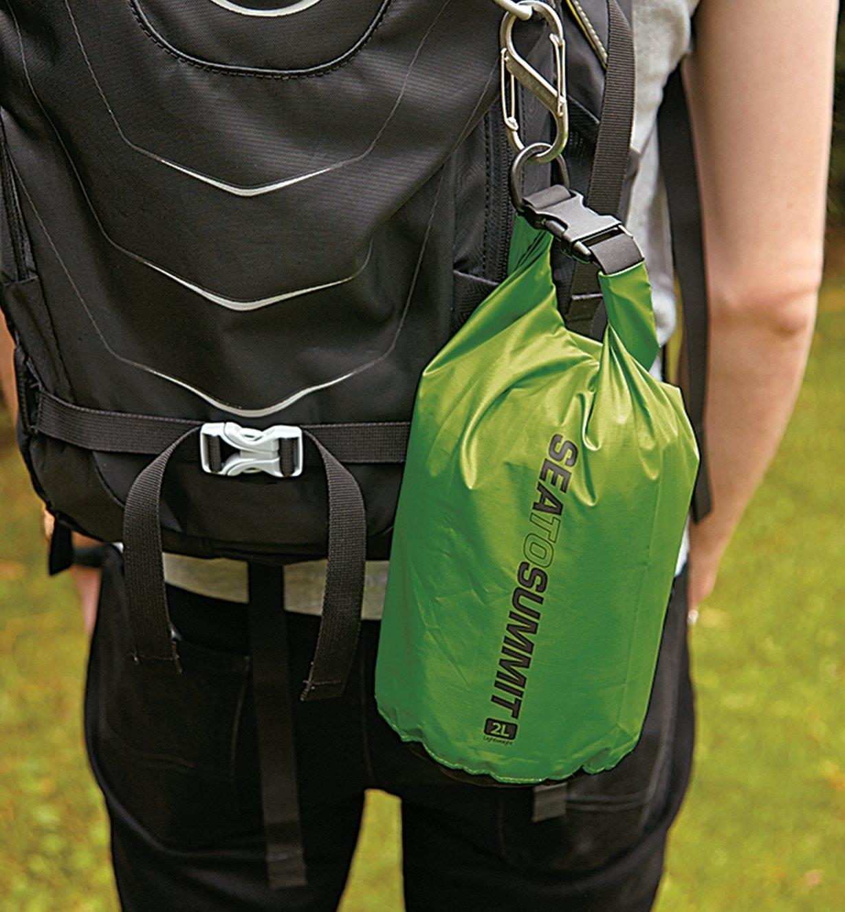 A small Dry Sack hanging from a backpack