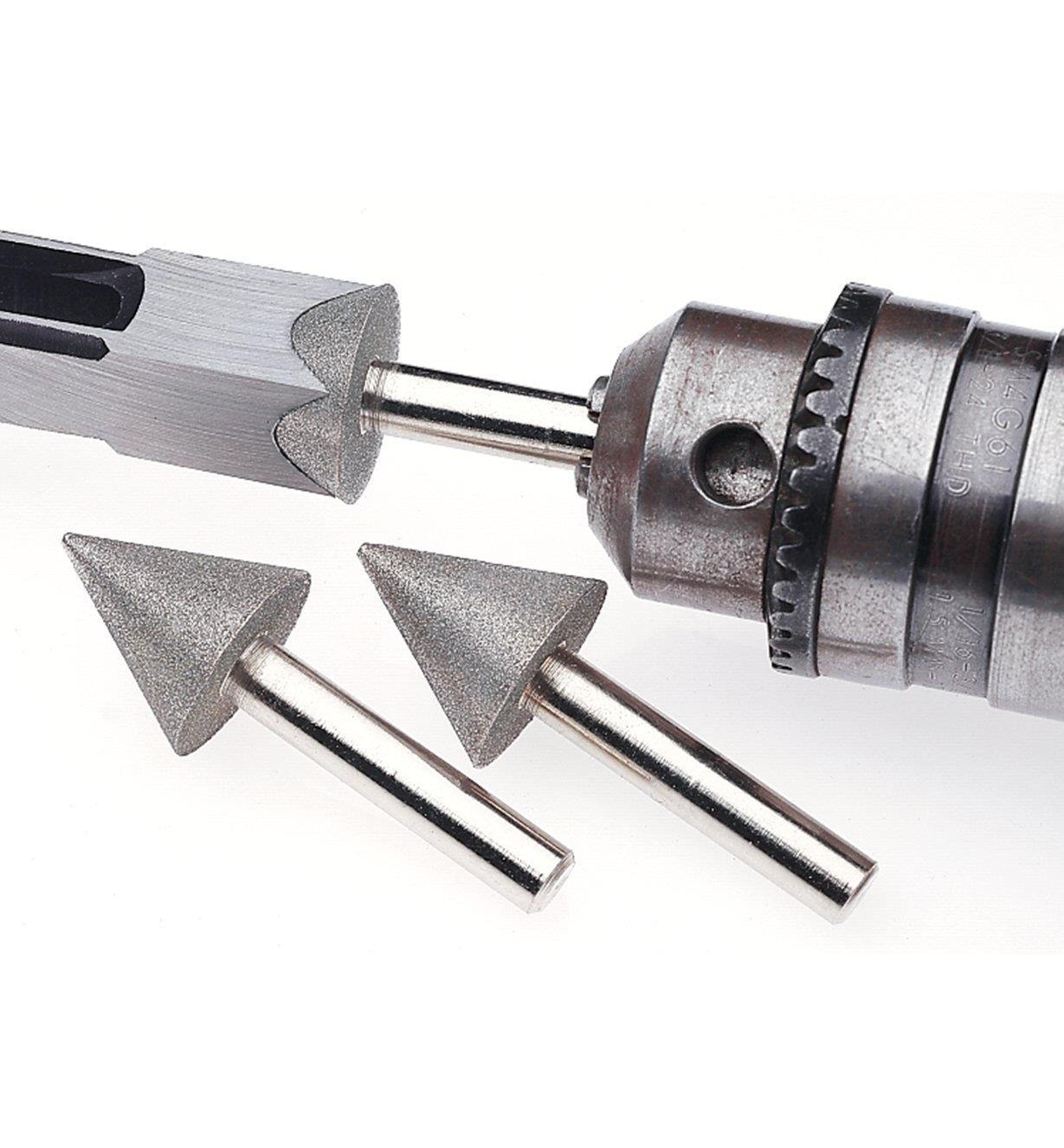 Conical sharpener in a drill being used to sharpen a hollow mortise chisel bit