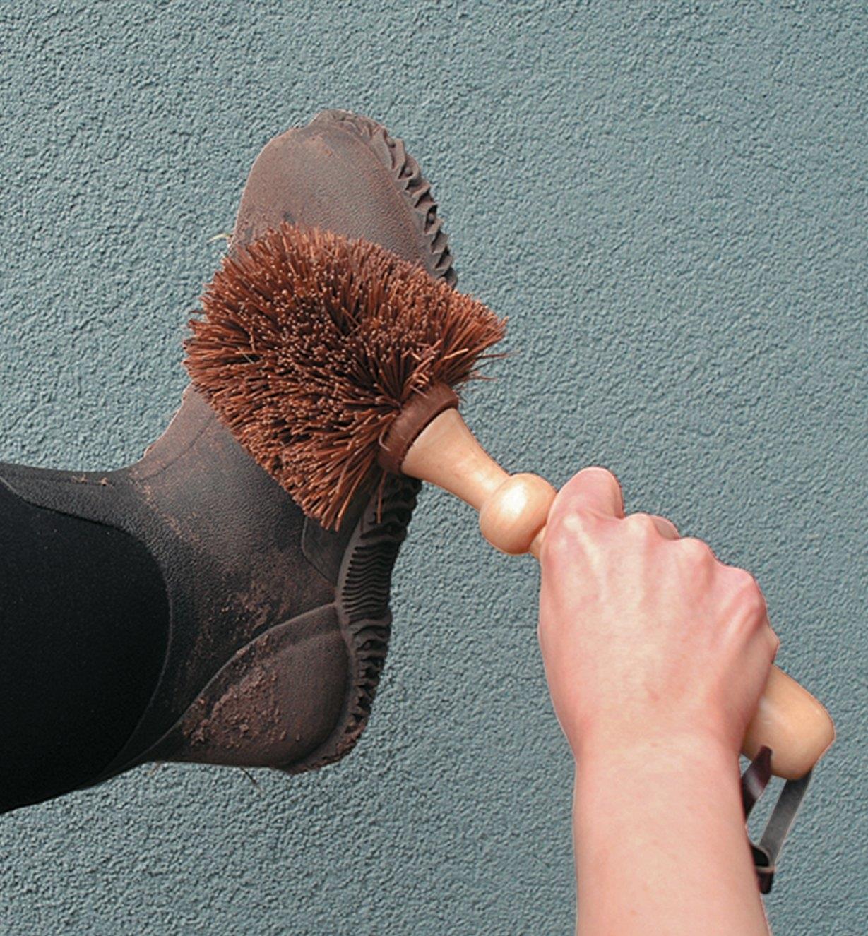 Cleaning a boot with the Heavy-Duty Brush