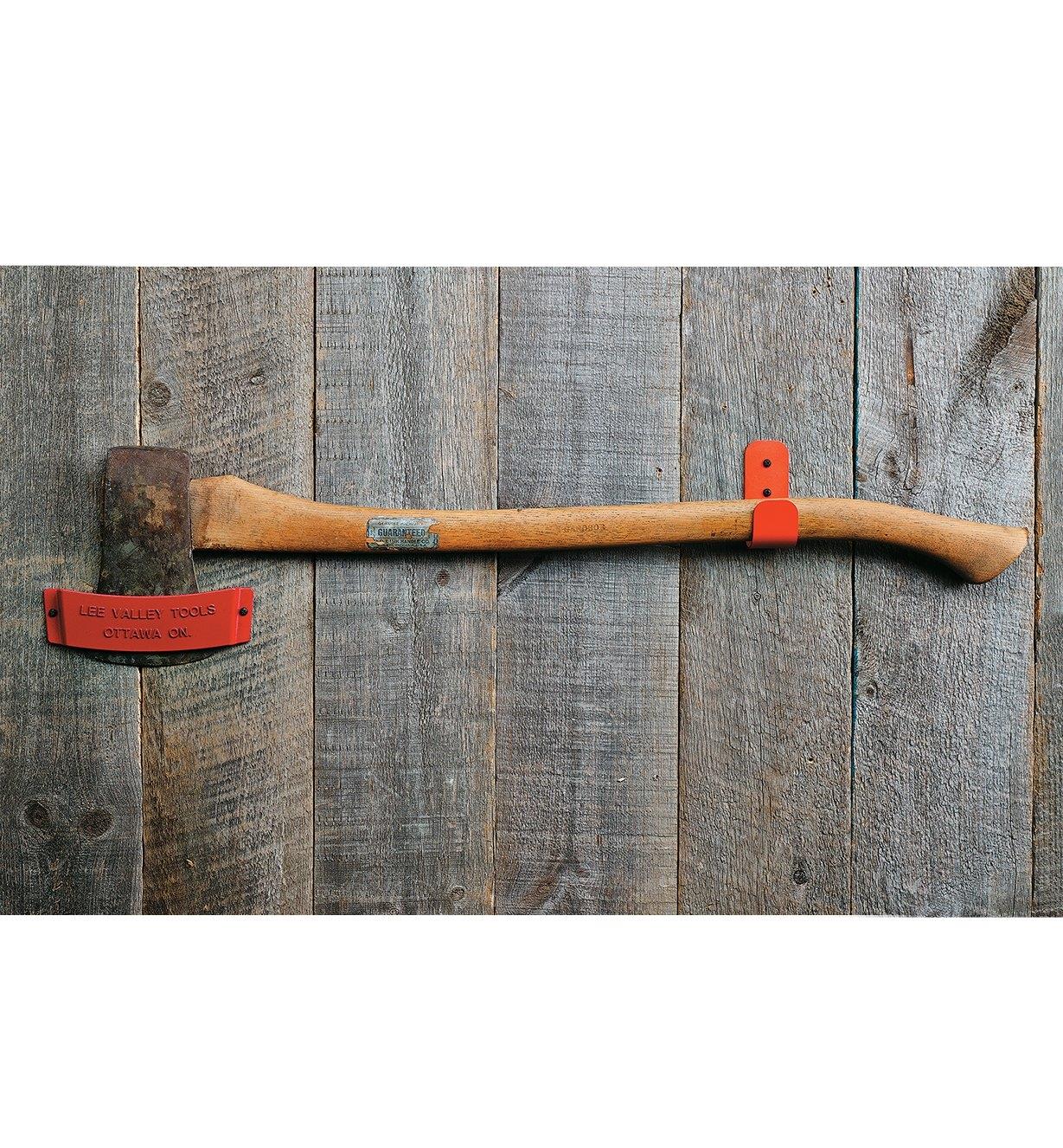 Axe Bracket Set holding an axe on a wall