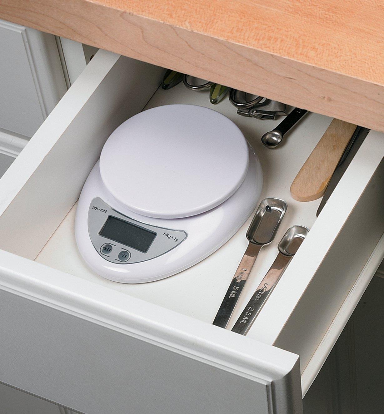 Mini Digital Kitchen Scale stored in a kitchen drawer