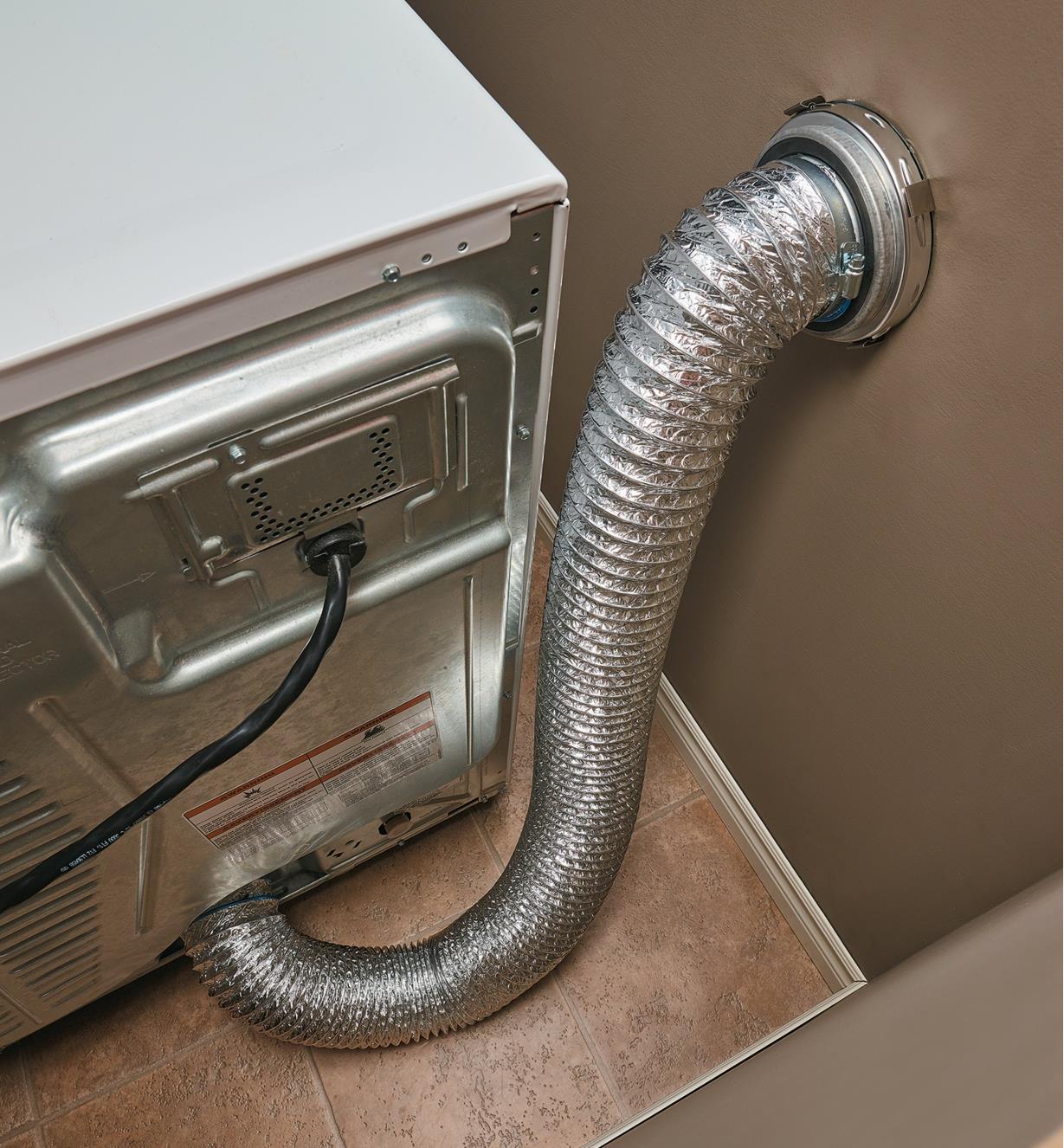 MagVent MV-Flex Dryer Vent Connector connecting a dryer to a wall duct with expandable duct hose