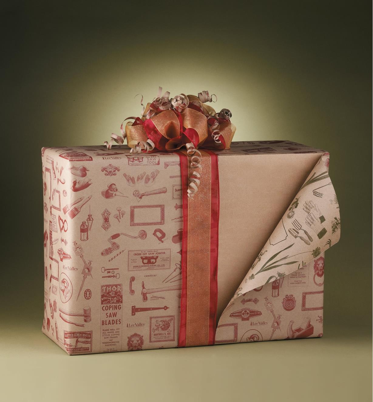 A present wrapped in Lee Valley wrapping paper with one side flipped down to show both patterns