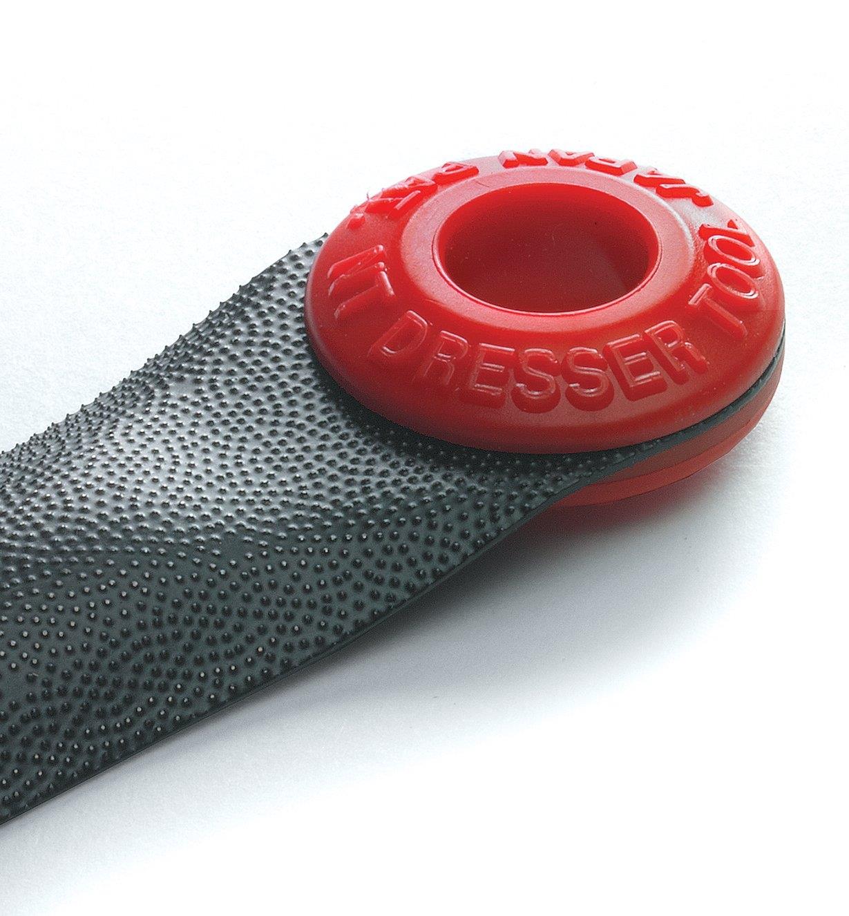 Close-up of a finger file grip