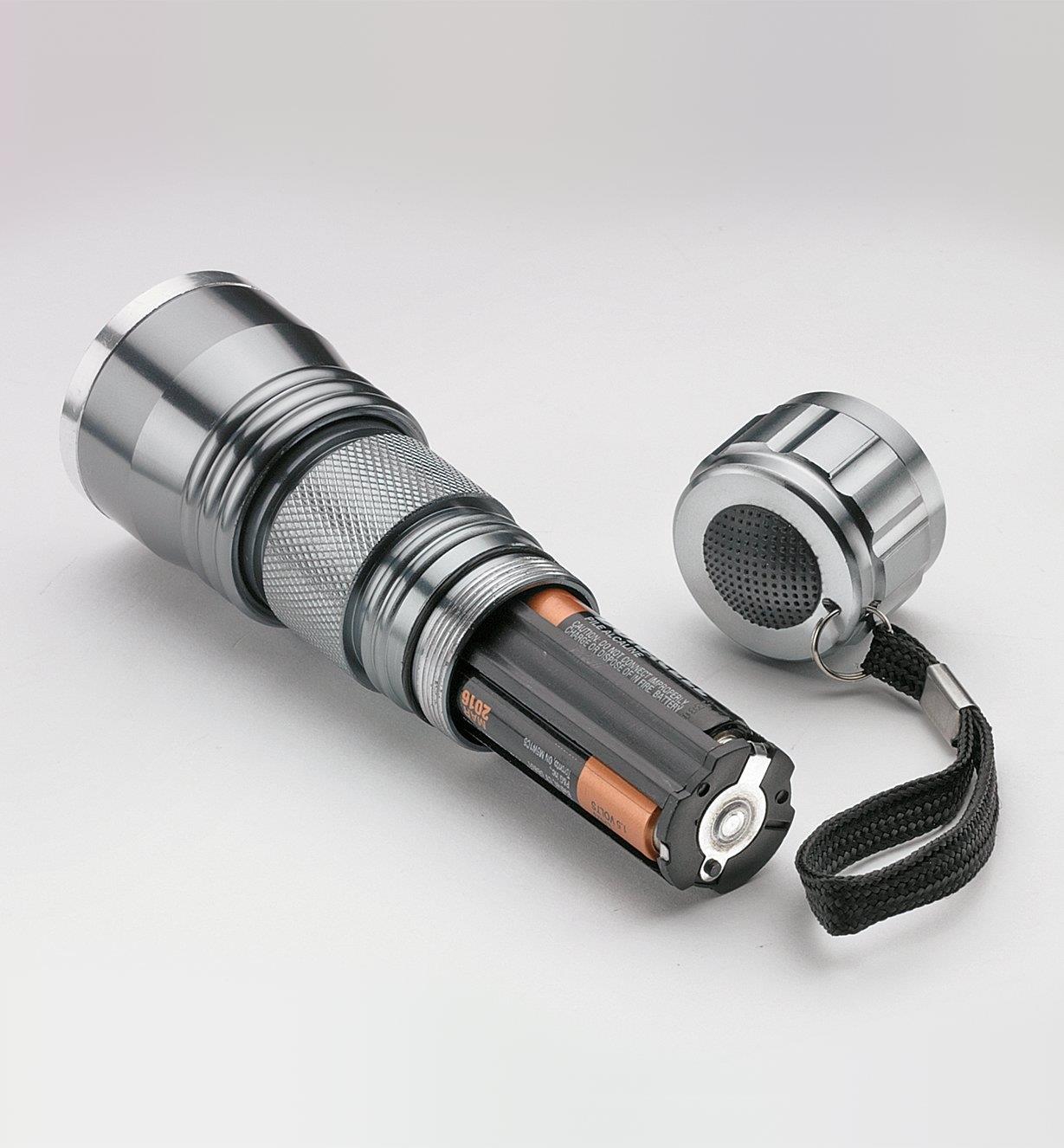 21-LED Flashlight with battery compartment removed to show three AAA batteries