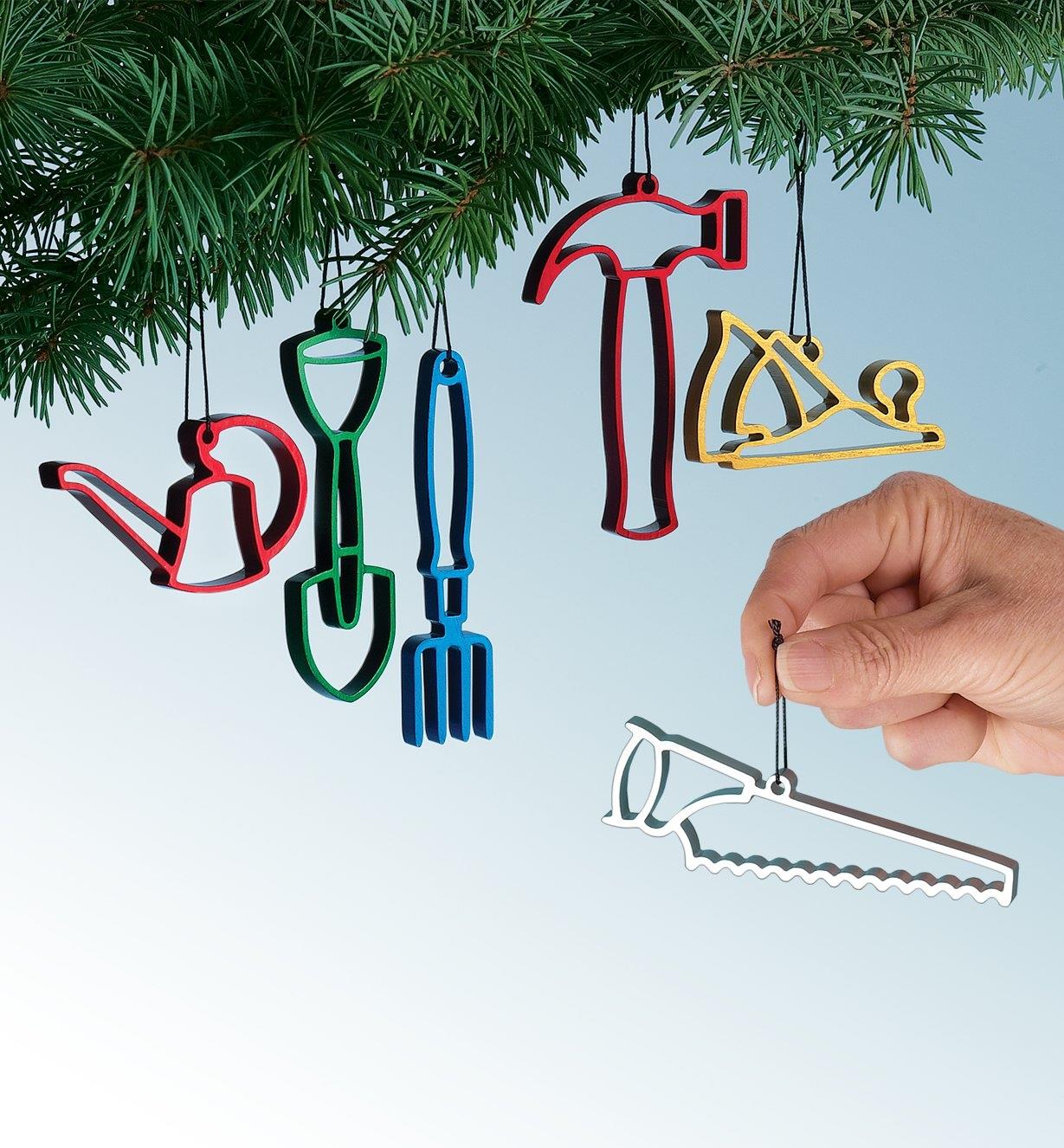Six Lee Valley Ornaments being hung on a Christmas tree