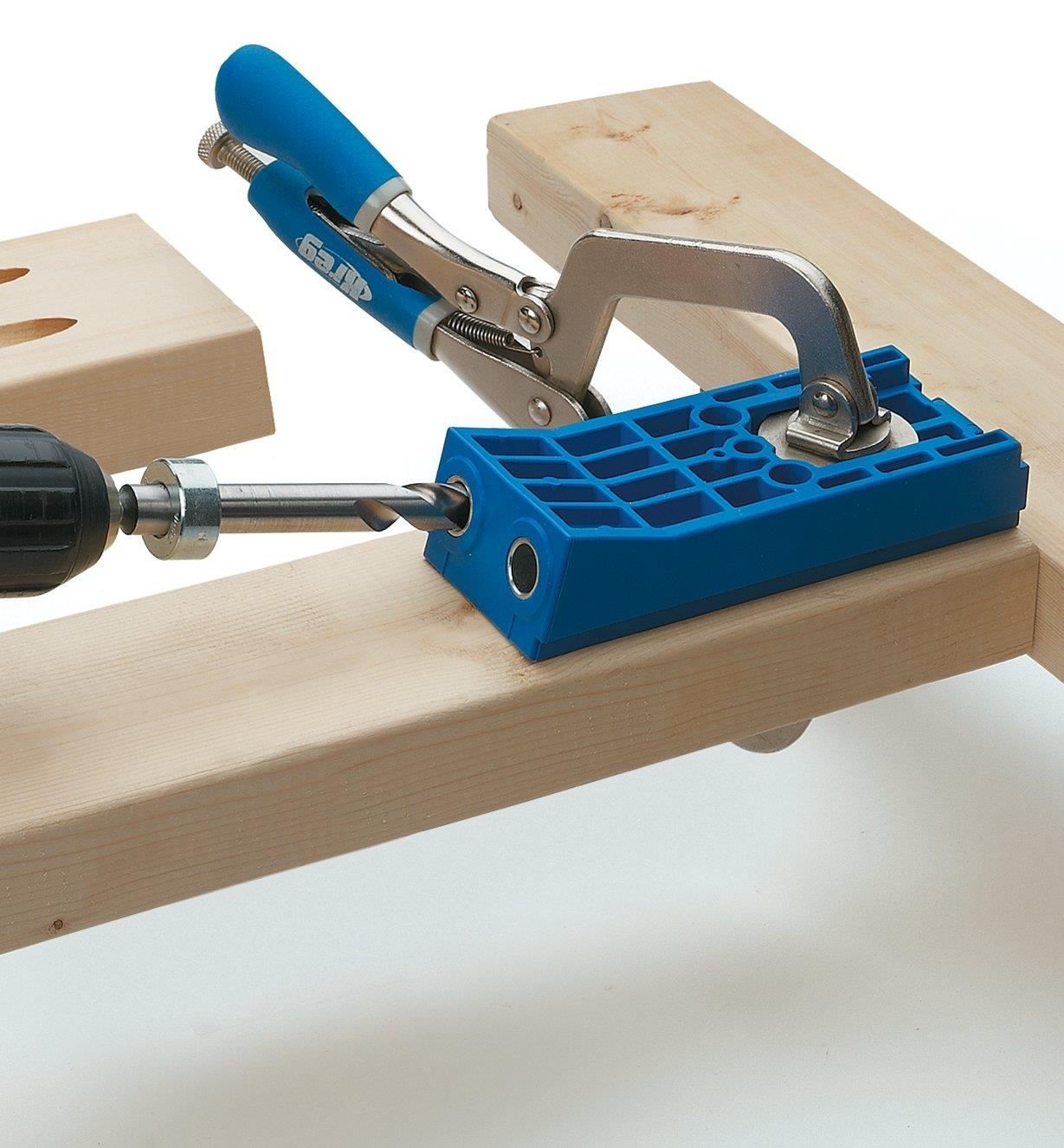 Drilling pocket holes using Kreg Heavy-Duty Jig clamped to a board