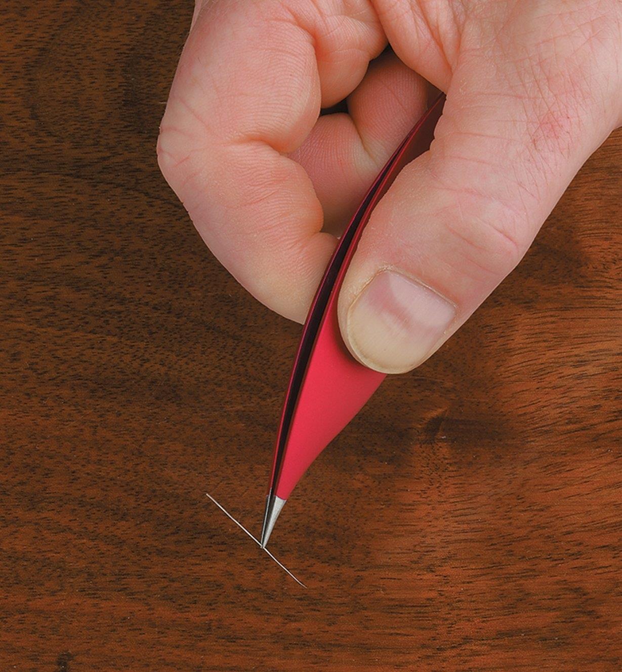 Picking up a sewing needle with Micro-Tip Tweezers