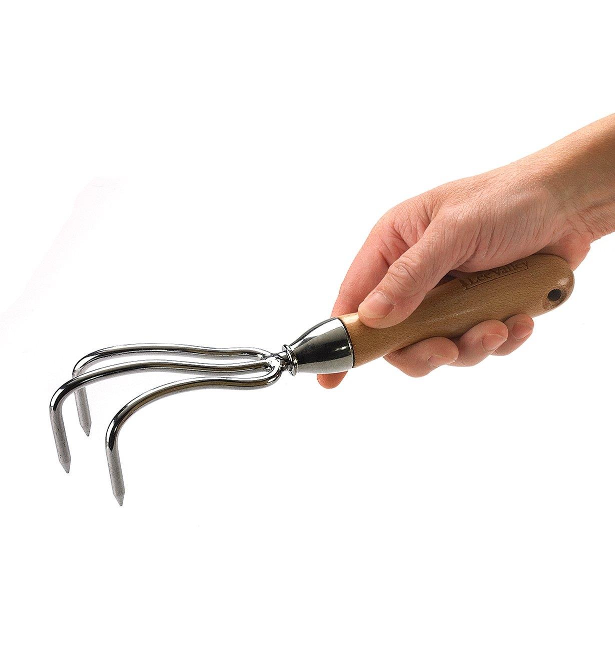 Lee Valley Premium 3-Prong Cultivator held in a hand