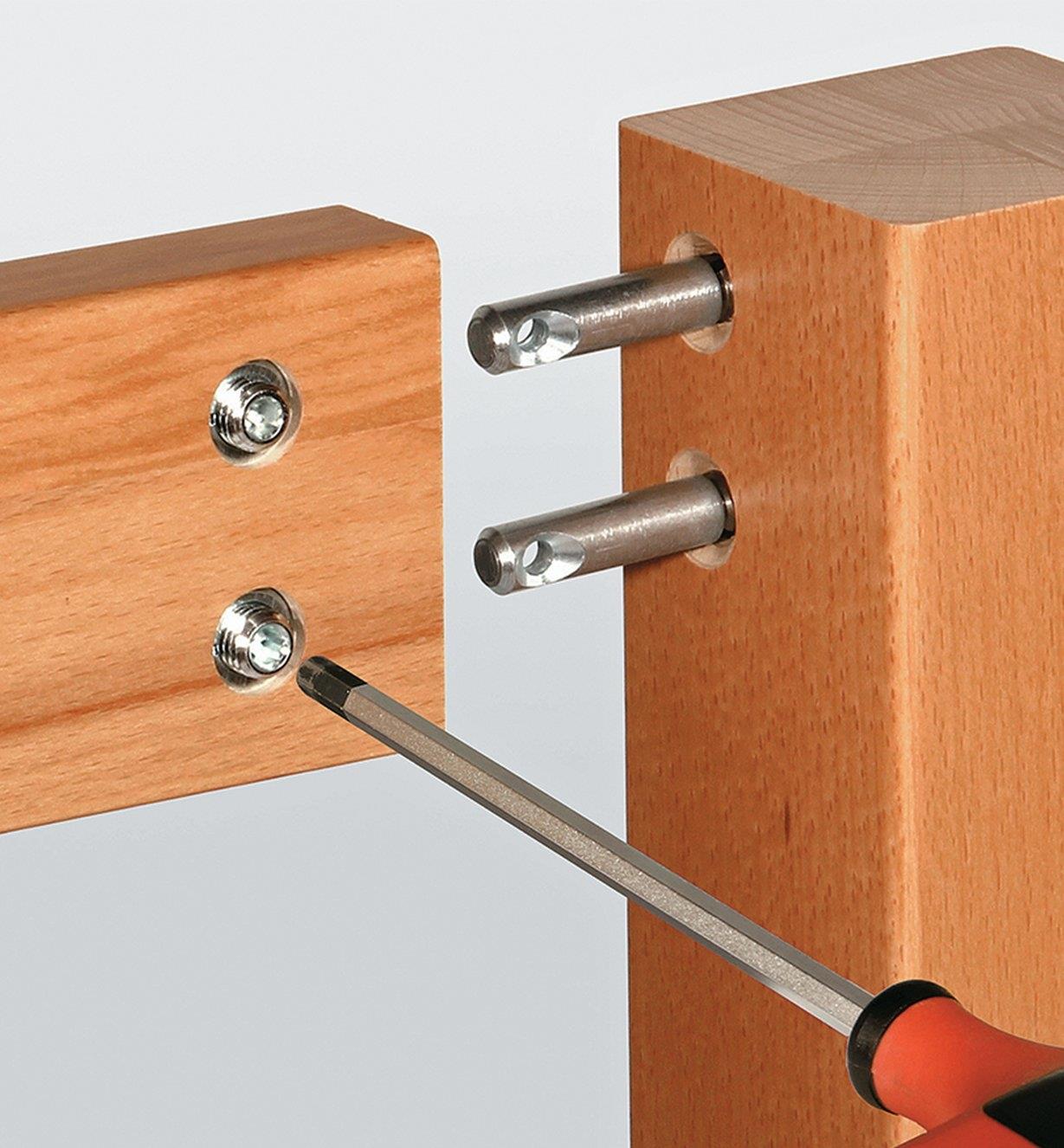 Installing cross dowels in one side of a joint