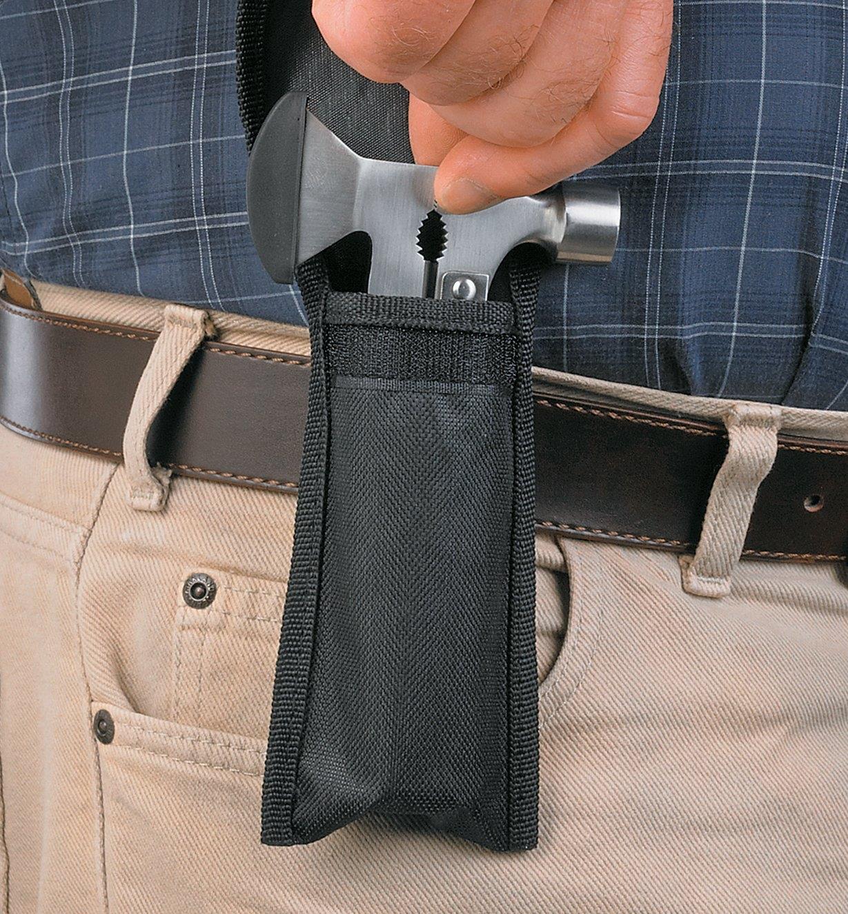 Multi-Tool carried in the holster on a belt 