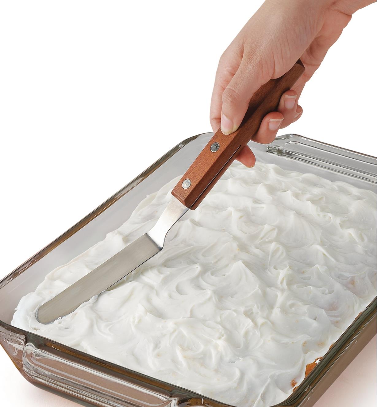 Using the Offset Frosting Spatula to frost a cake in a baking pan