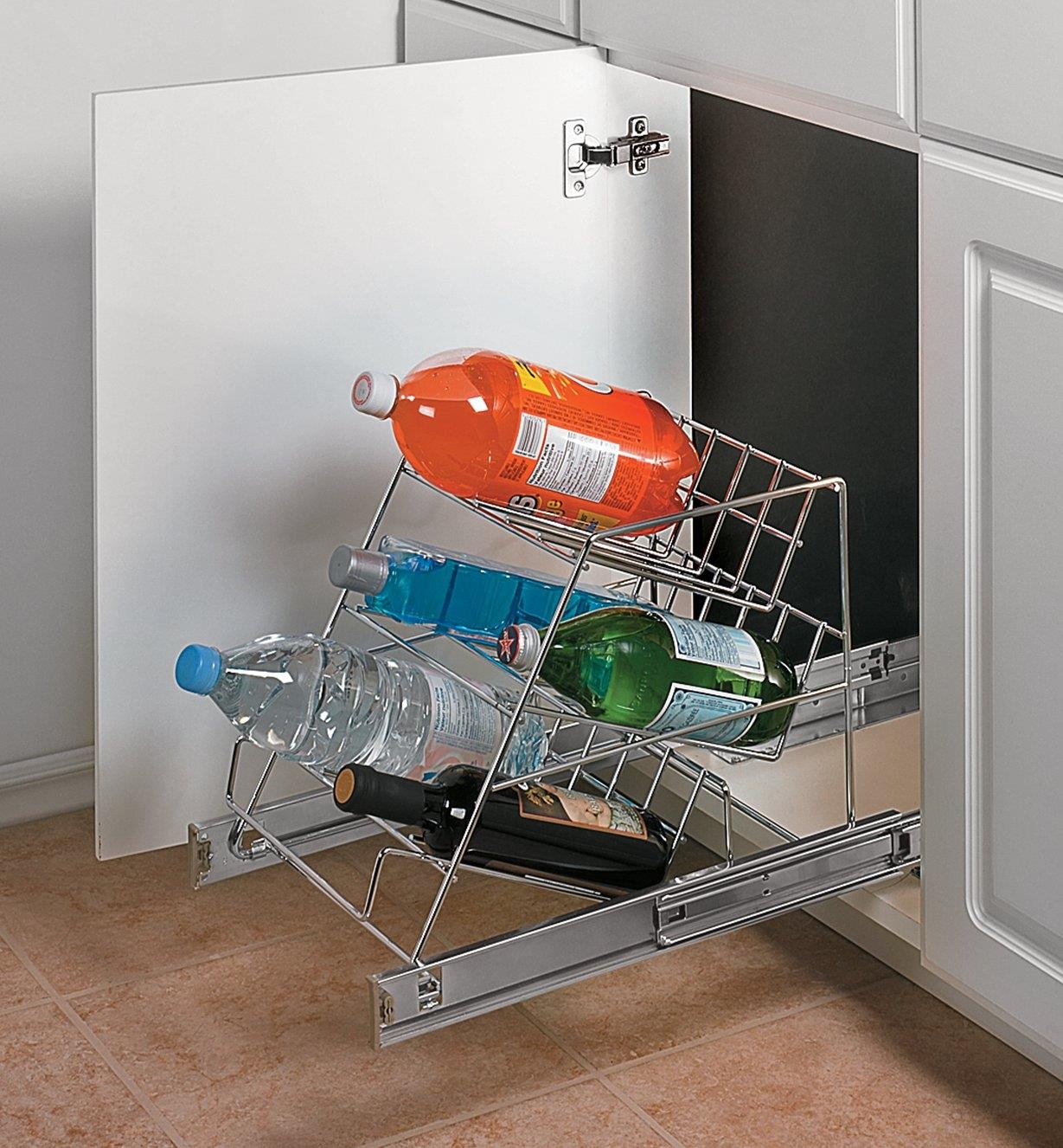 Angled Rack Pullout mounted in a cupboard, holding bottled beverages