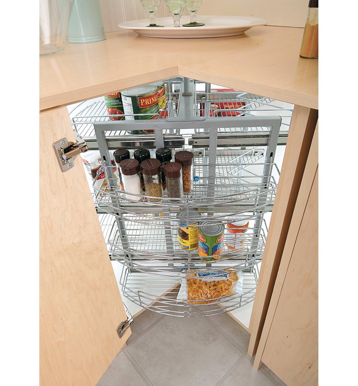 Pull-Out Corner Carousel installed in a cabinet, rotated to access food at the back