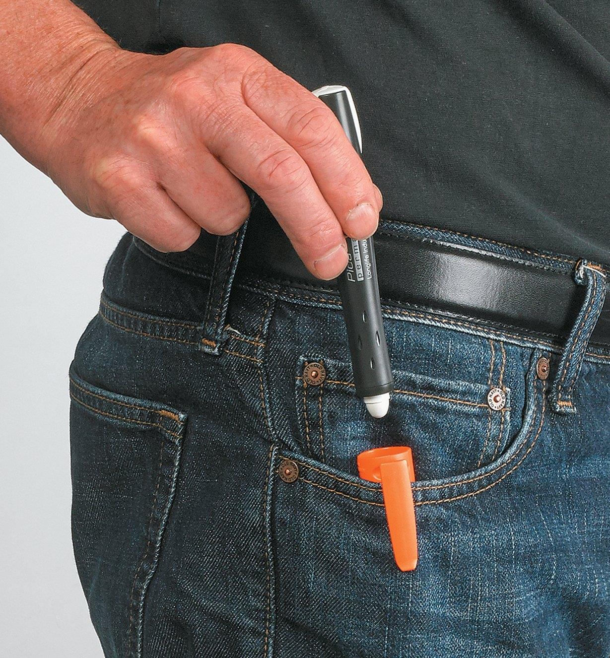 Carrying a Pica-Visor White Marking Crayon holster in a pants pocket