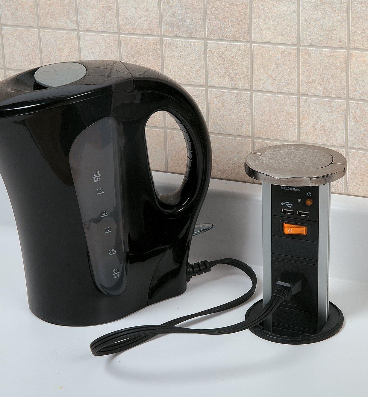 Pull-Out Power Bar halfway open with electric kettle plugged into one of the sockets