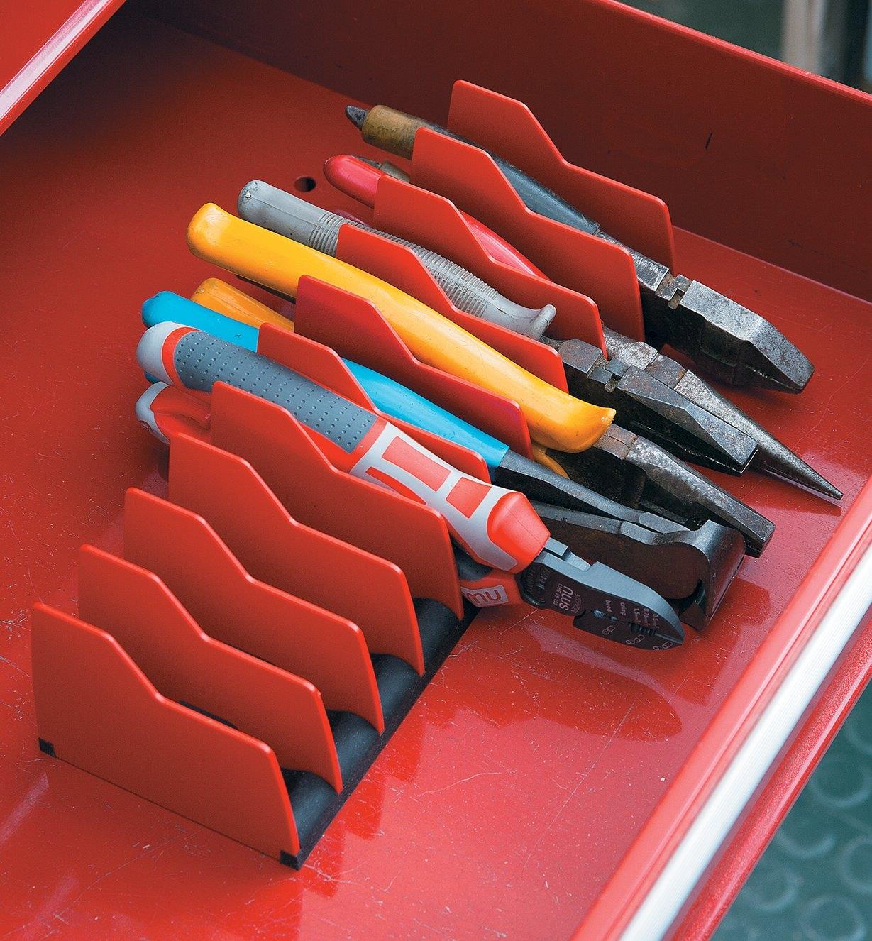 Various plyers held in a Pliers Organizer in a tool drawer
