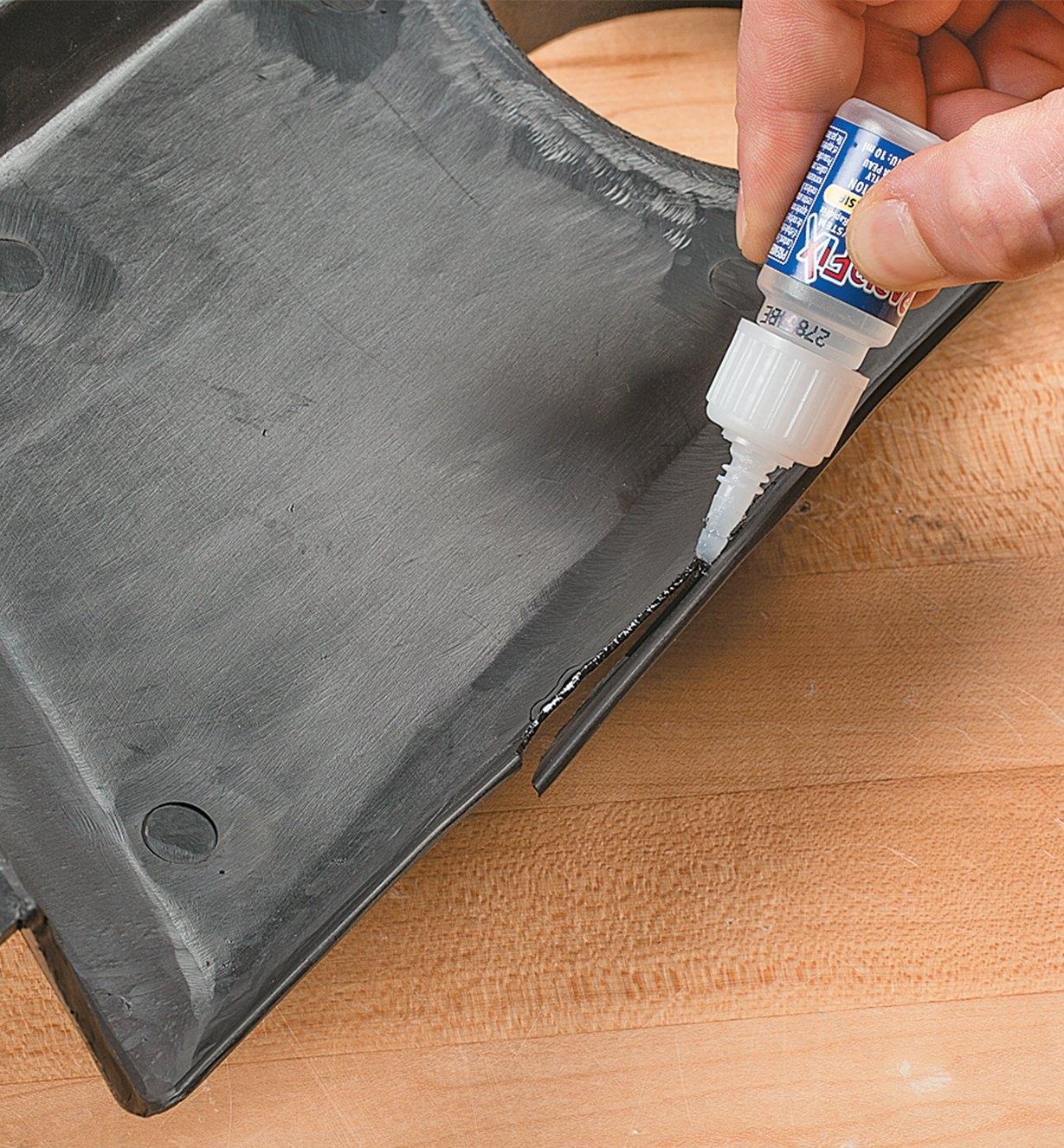 Applying glue to a broken plastic item