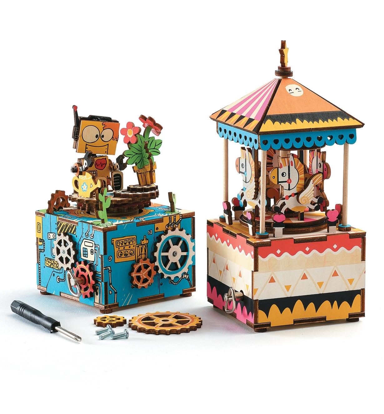 Completed robot and carousel music boxes