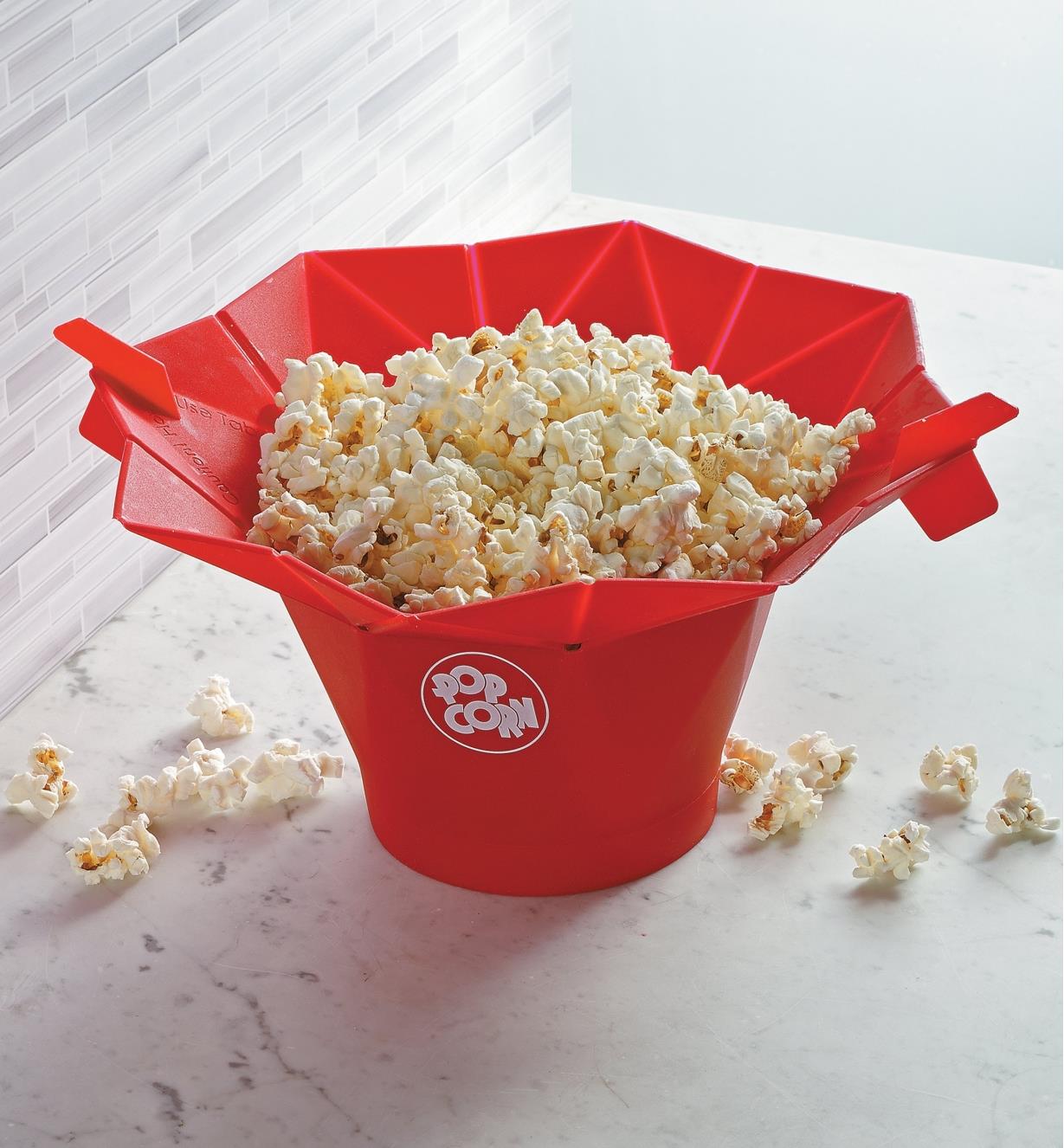 Poptop Popcorn Popper filled with popped popcorn