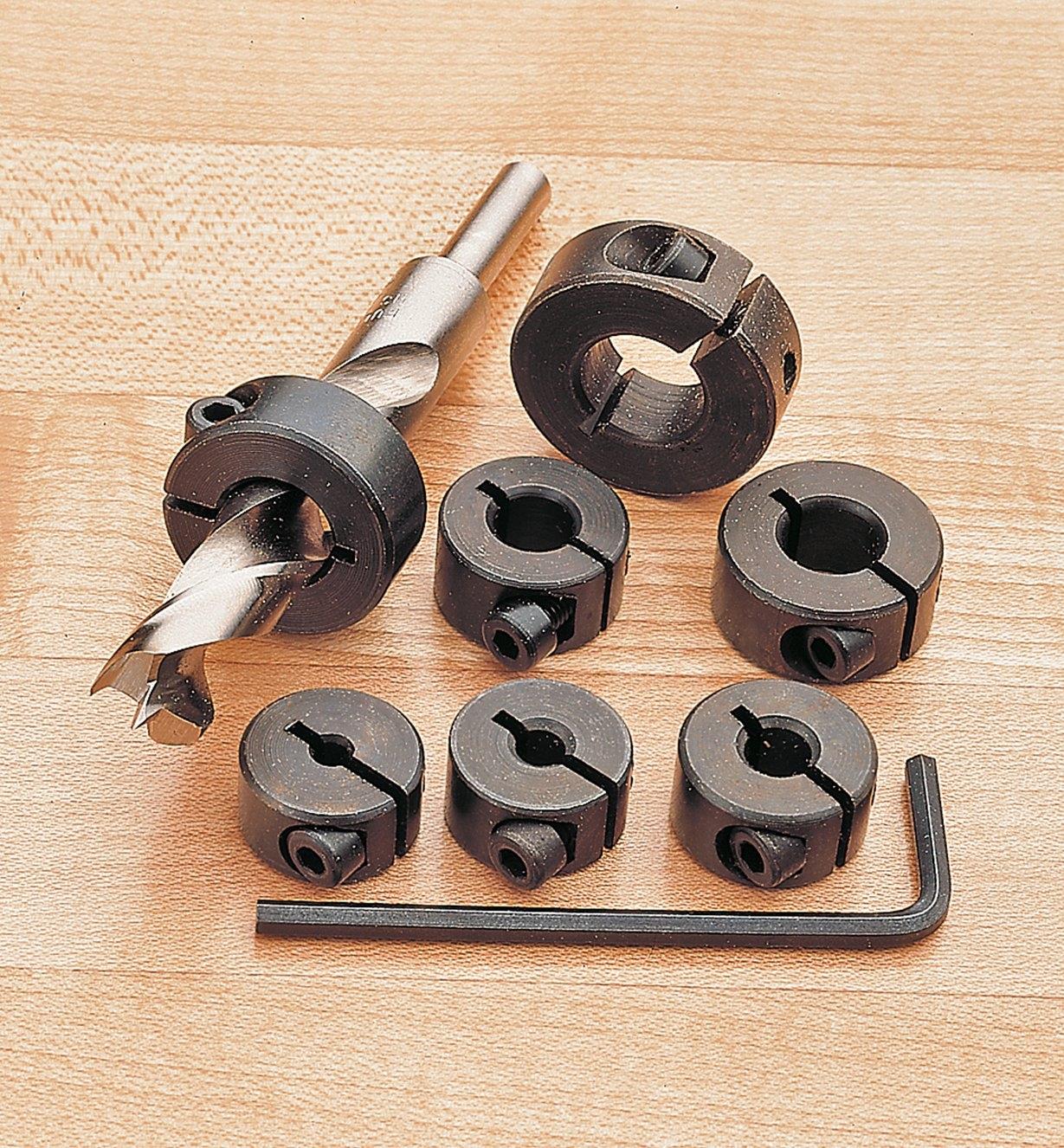 Set of 7 Collars, with one of them in place on a drill bit as an example