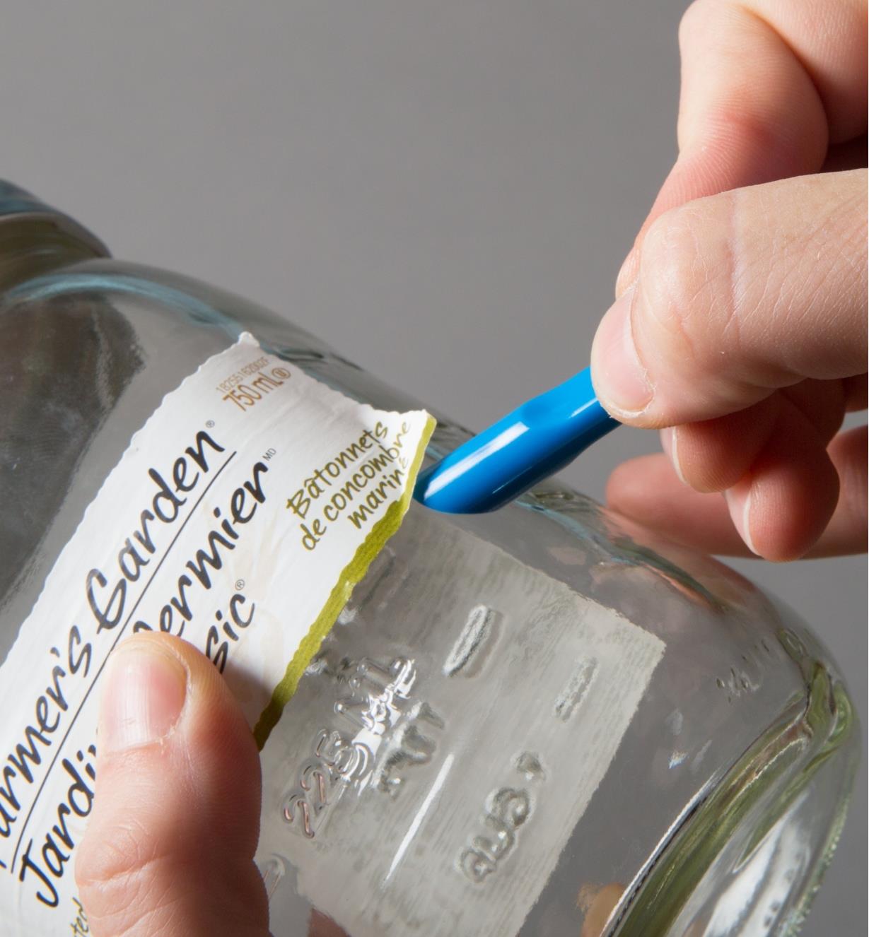 Using a Scrigit Scraper to remove a label from a jar