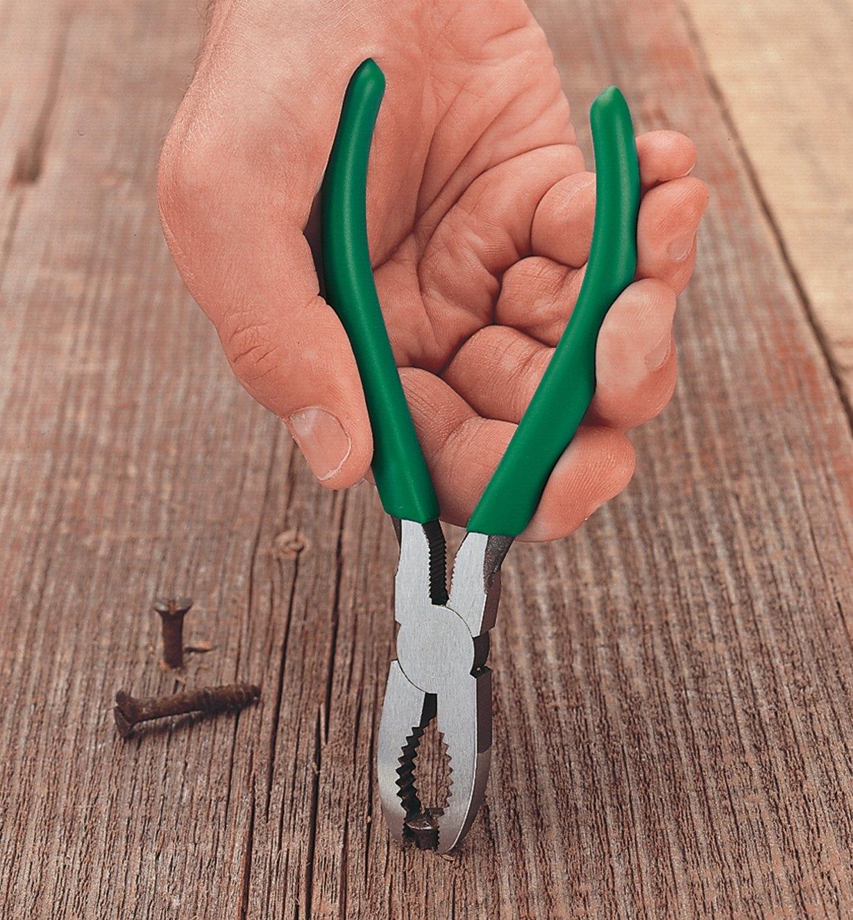 Using Screw Pliers to remove a screw from wood