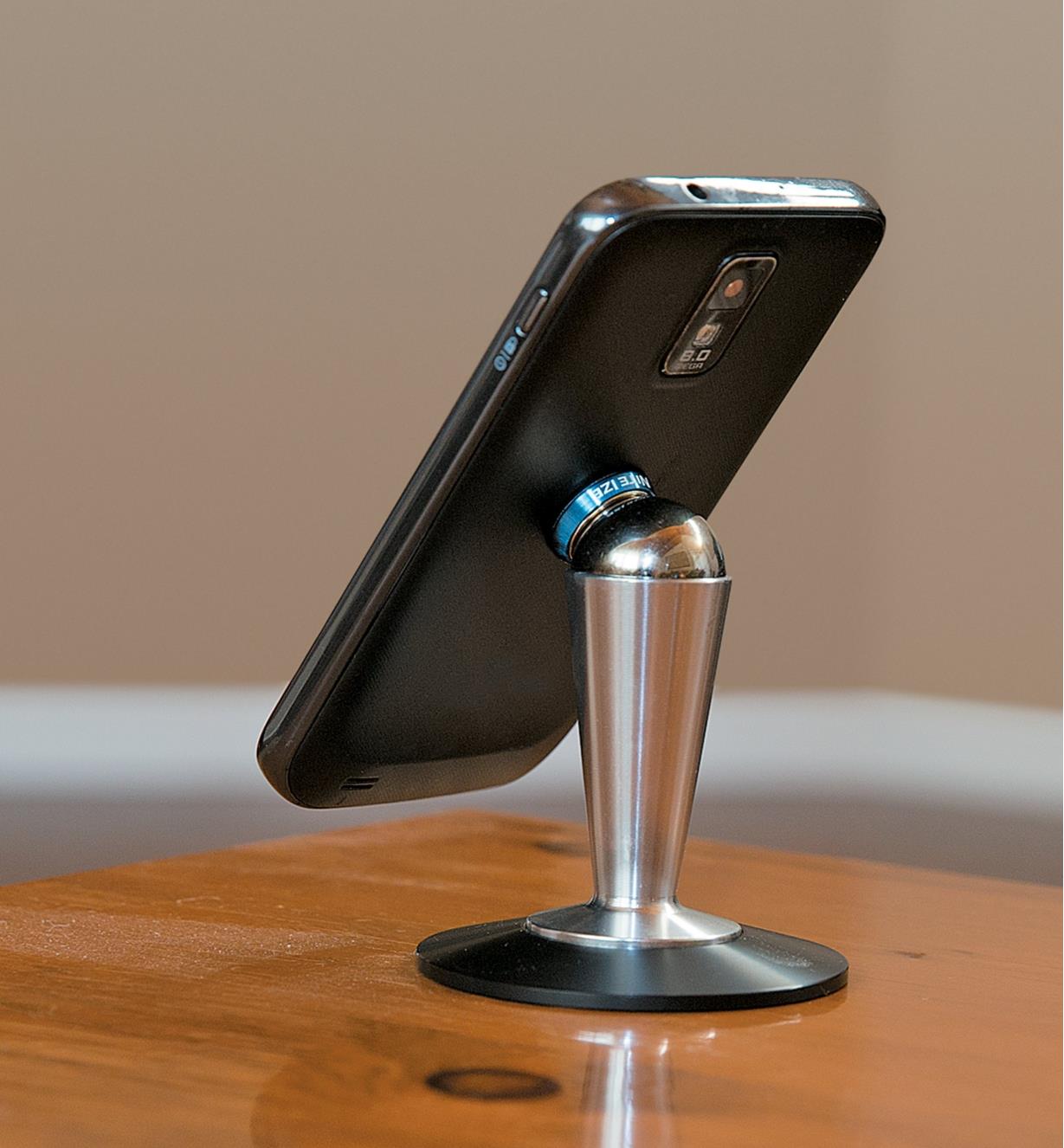 Steelie Smartphone Pedestal holding a phone vertically