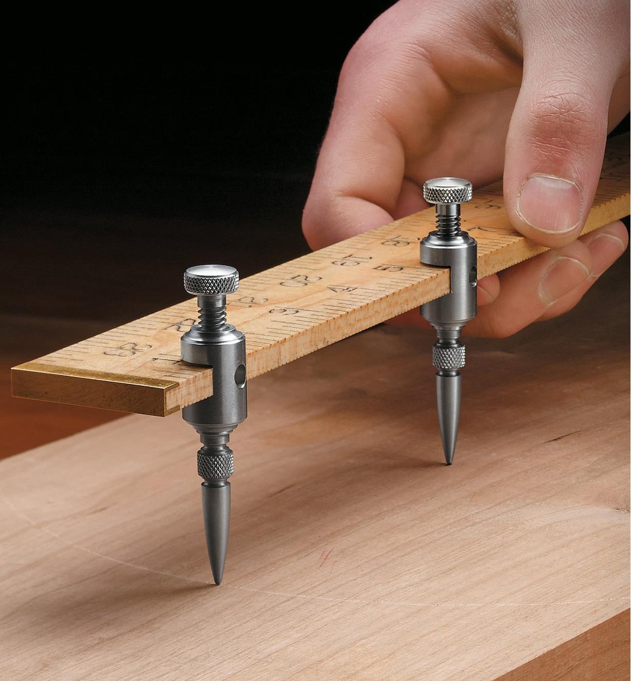 Veritas Trammel Points clamped to a wooden ruler