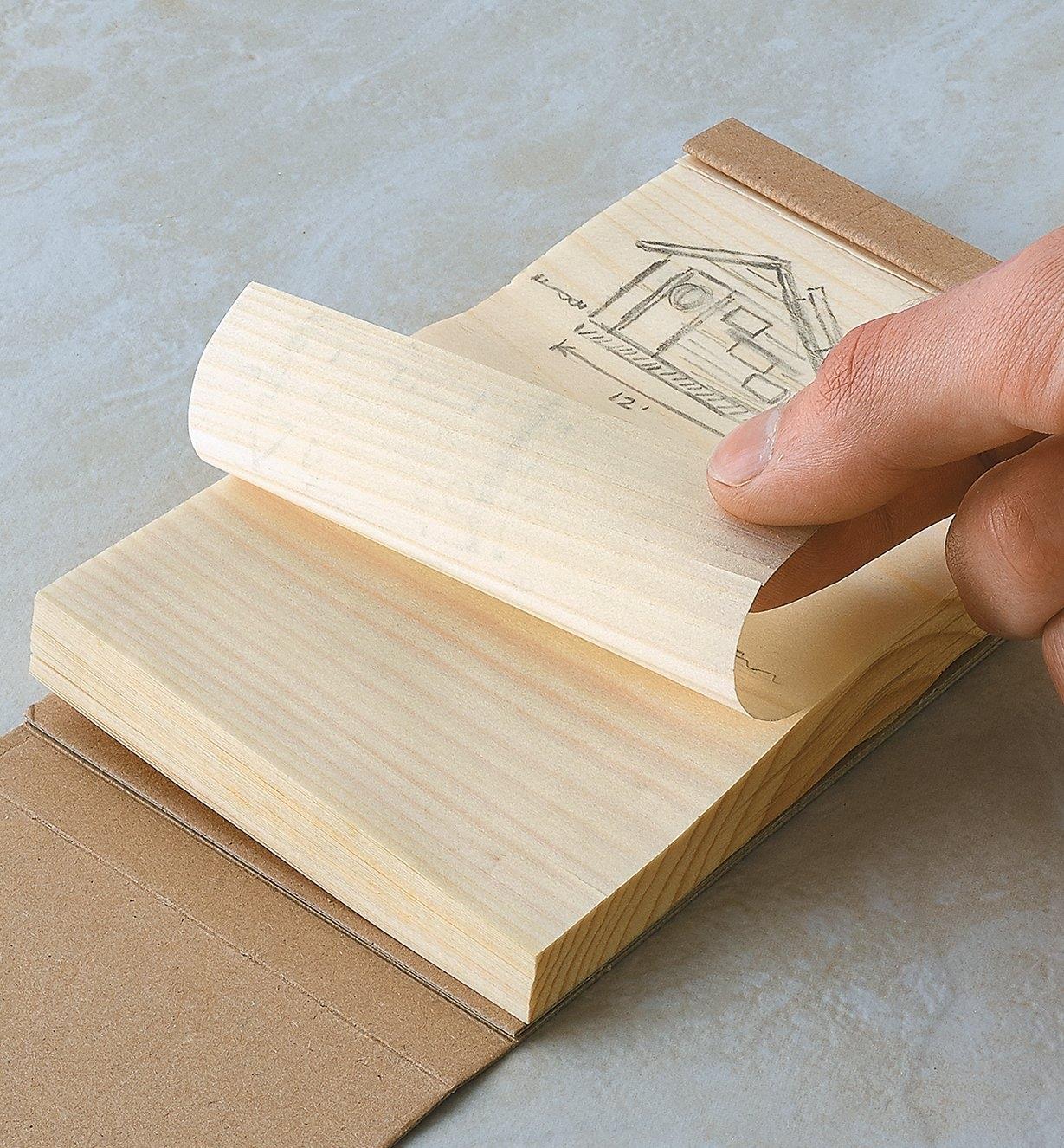 Flipping through the pages of the 3" x 4" Wooden Kyougi Notepad