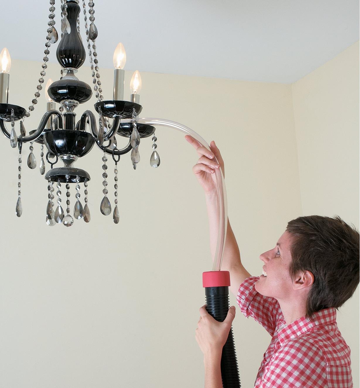 Vacuuming a chandelier using Vaccuflex