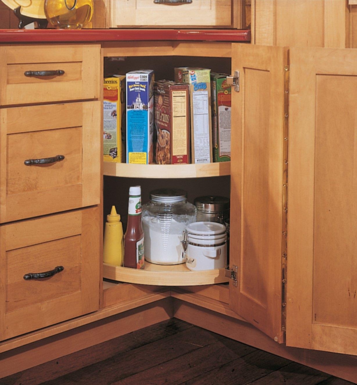 Example of kidney shelf installed in a corner kitchen cabinet