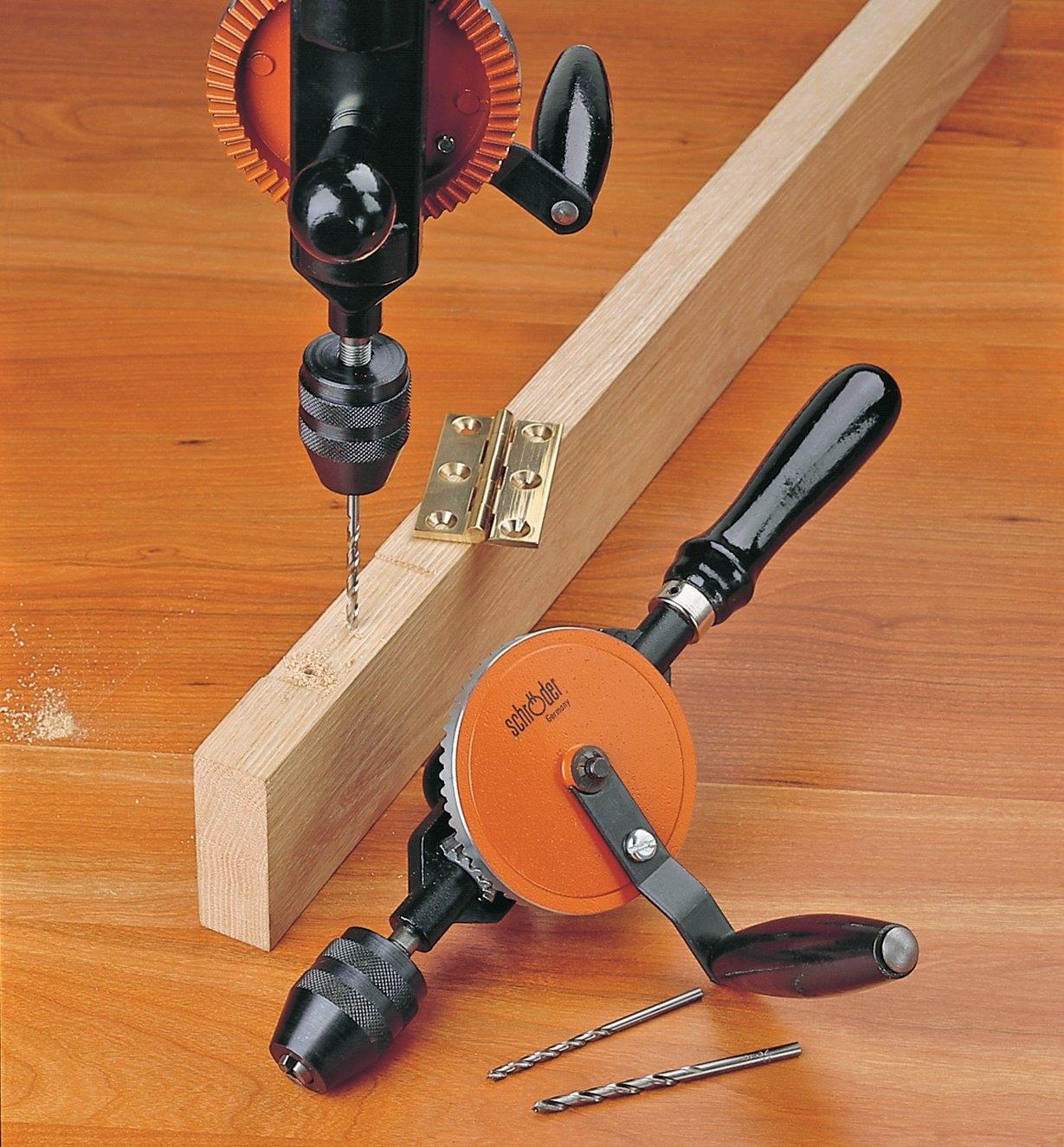 Using a Traditional Hand Drill to drill into the side of a board