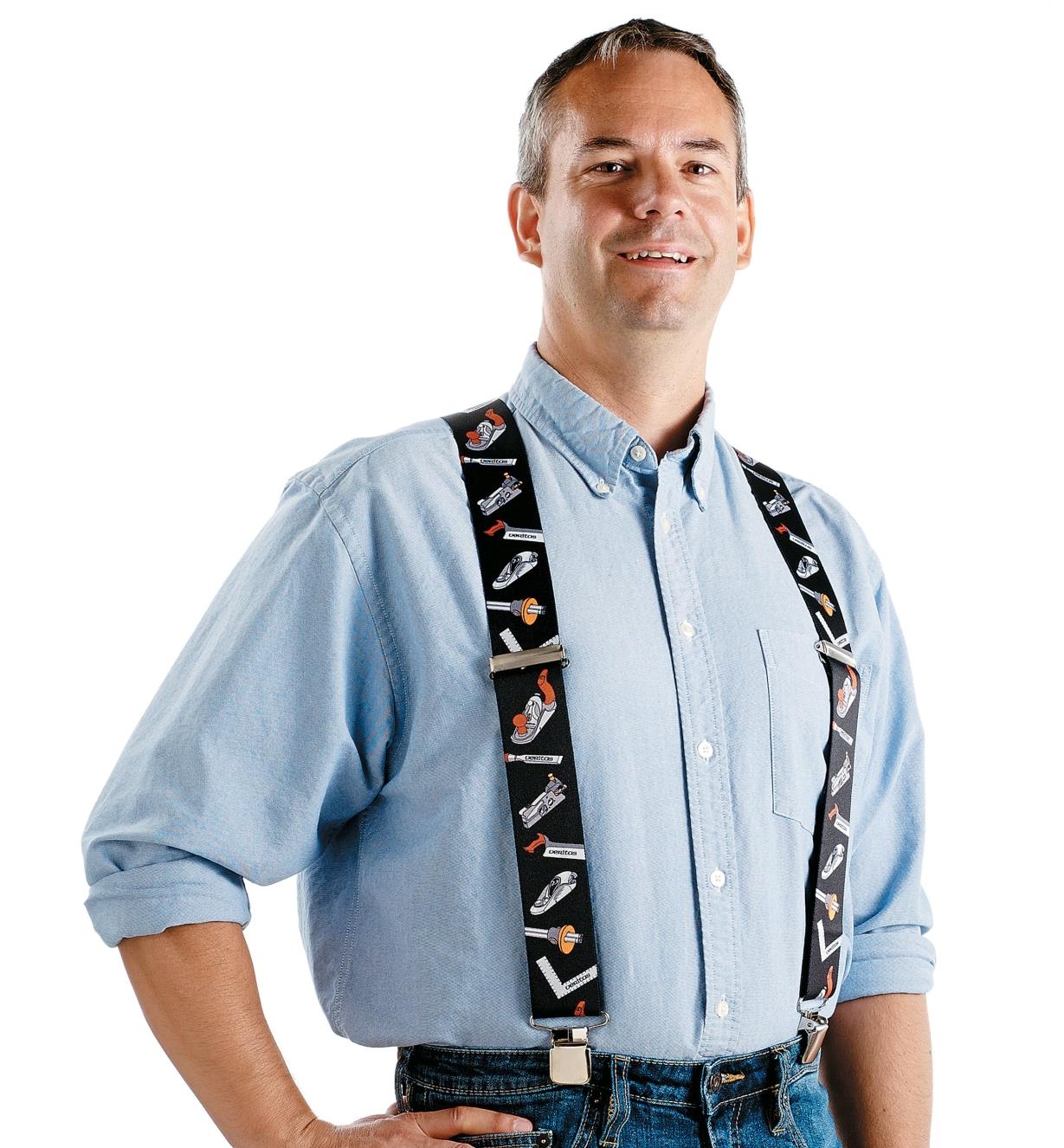 Front view of a man wearing Veritas Suspenders
