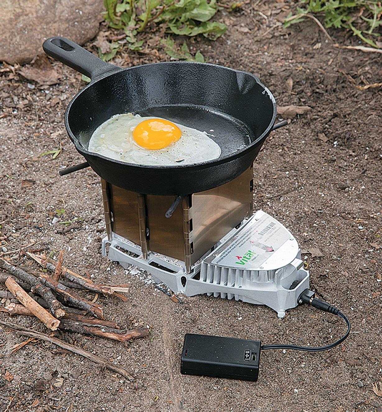 Cooking an egg in a frying pan on a VitalGrill Camp Stove
