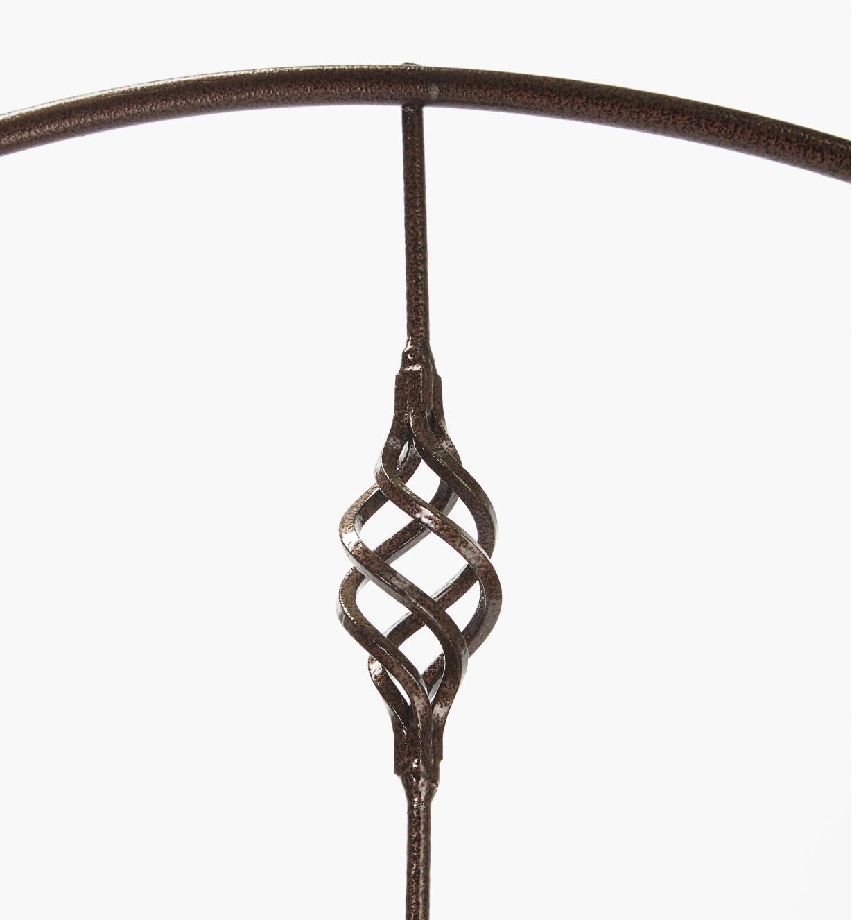 Closer view of decorative twist on the Venetian garden trellis with hammered copper finish