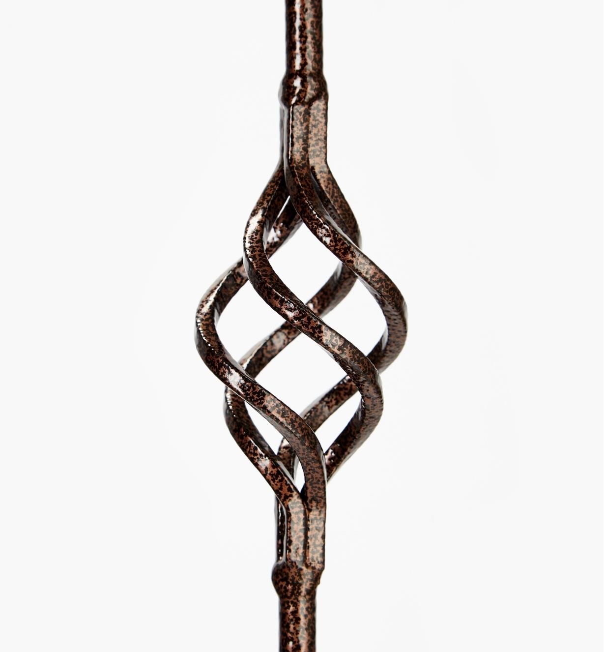 Closer view of decorative twist on the Camelot garden trellis with a hammered copper finish