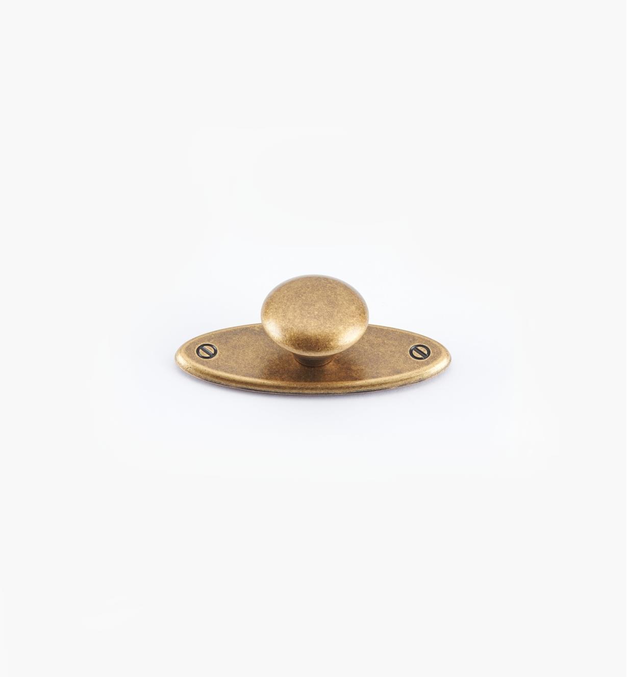 01X3030 - Bouton sur platine ovale, fini laiton antique, 65 mm x 25 mm