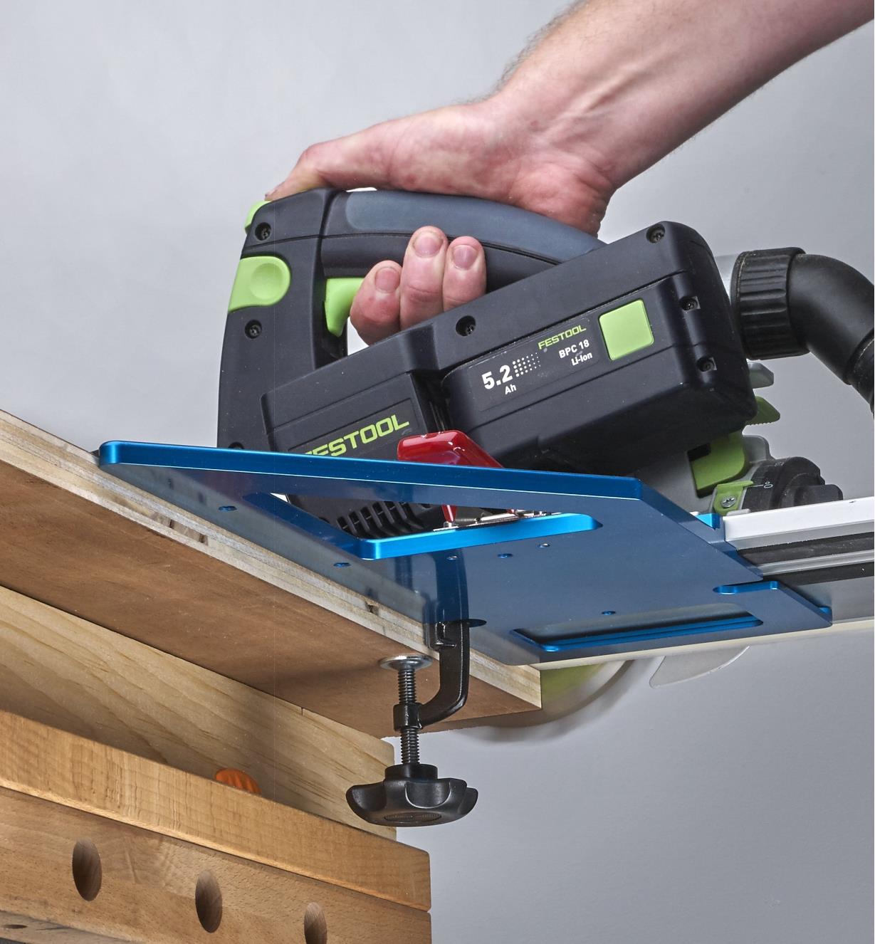 Using a track saw with a GRS-16 guide rail square on a Festool track-saw guide to cut plywood