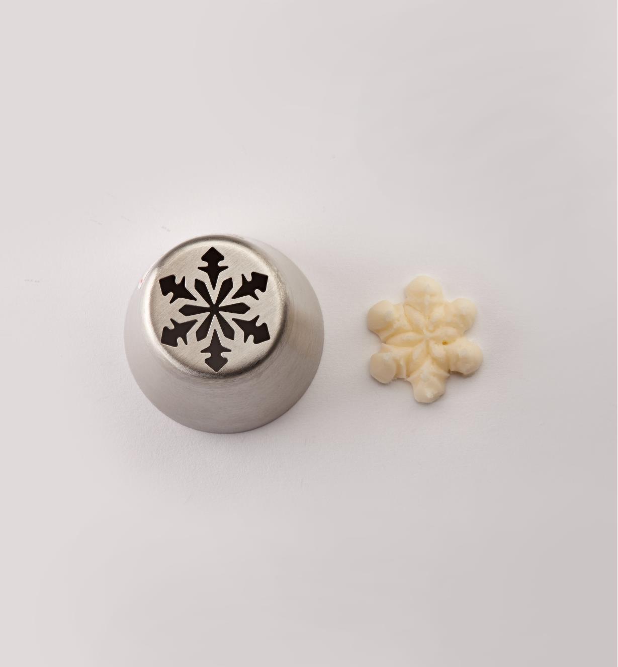 Snowflake piping tip #5 next to an example of a design made with it