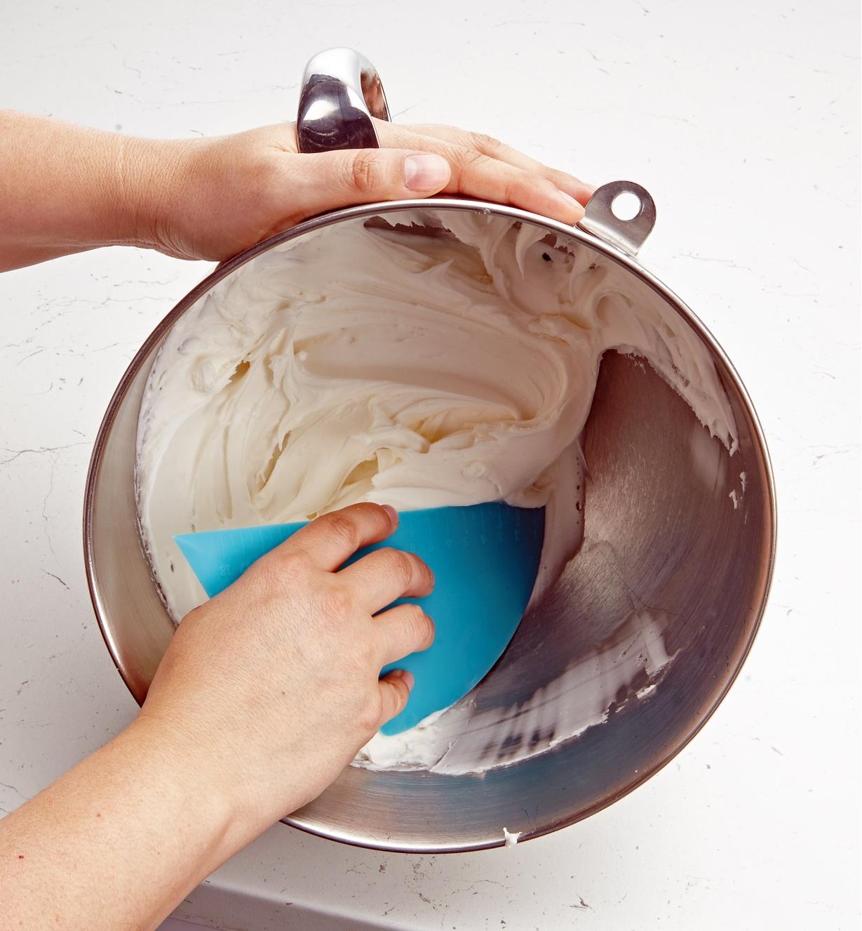 Scraping frosting from a bowl using the Bowl Scraper