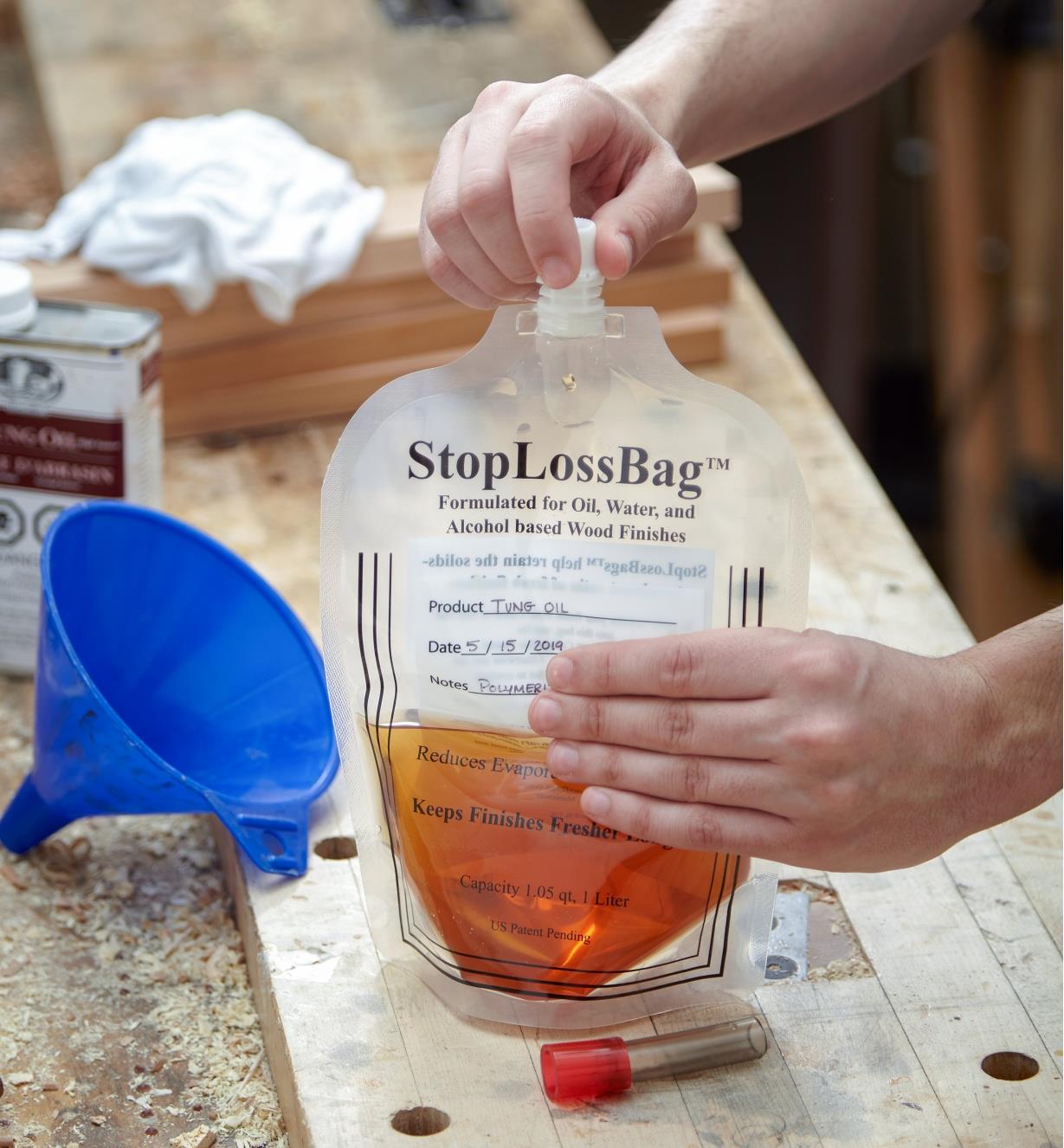 Sealing a filled Finish Storage Bag with the cap
