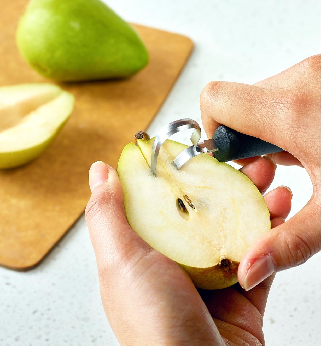 Coring a pear with the Fruit & Vegetable Corer