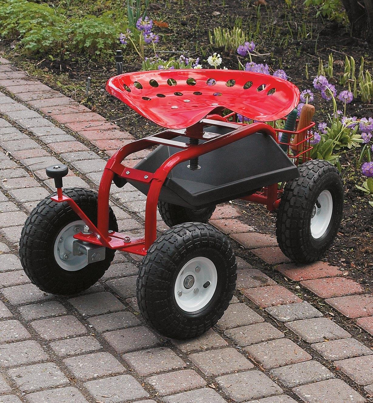 Steerable Rolling Seat with Tool Tray sitting on a garden walkway