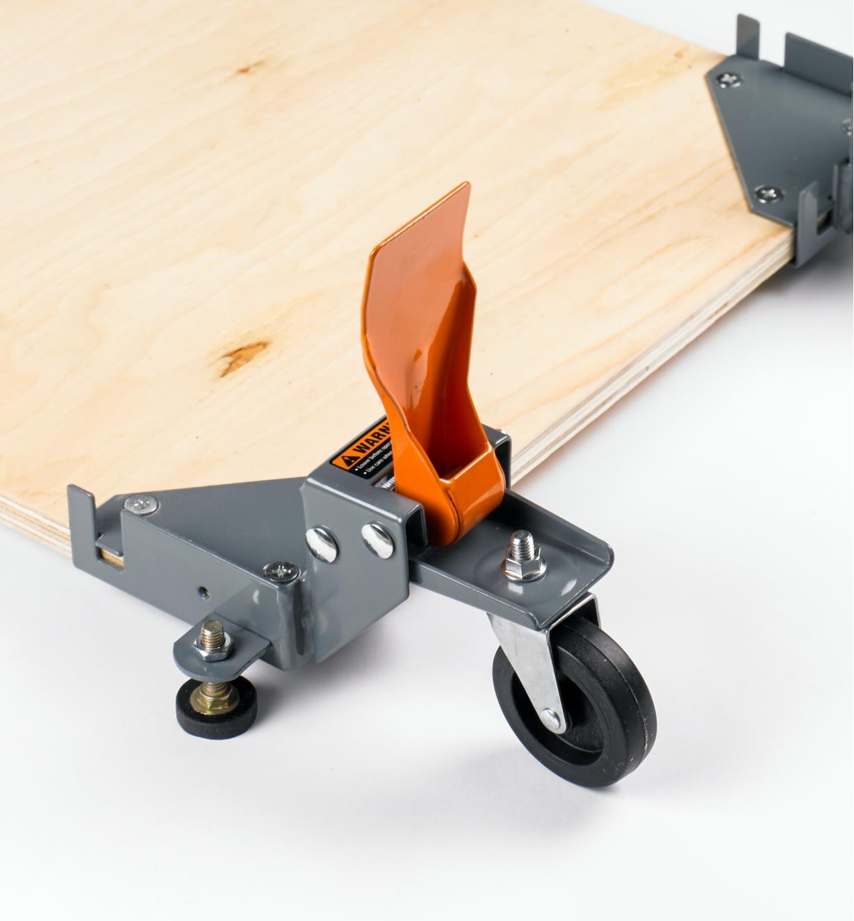 Close-up of installed caster with the lock engaged