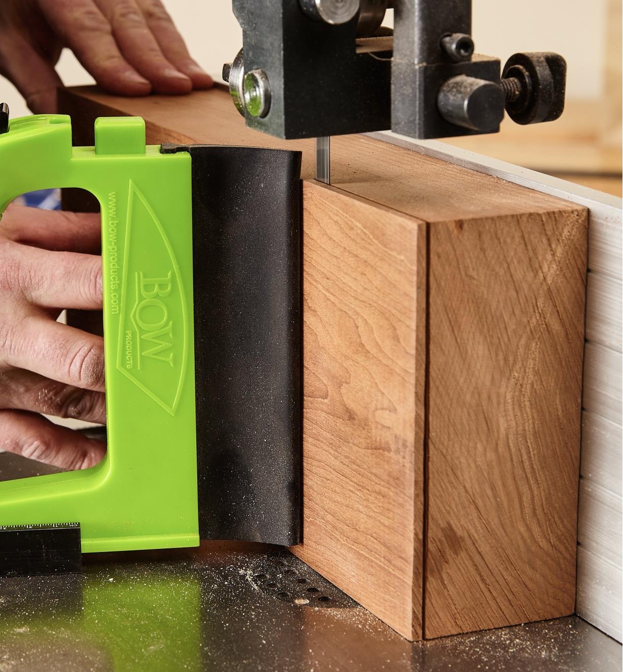 GuidePRO bandsaw guide used for resawing a tall, thick wood plank