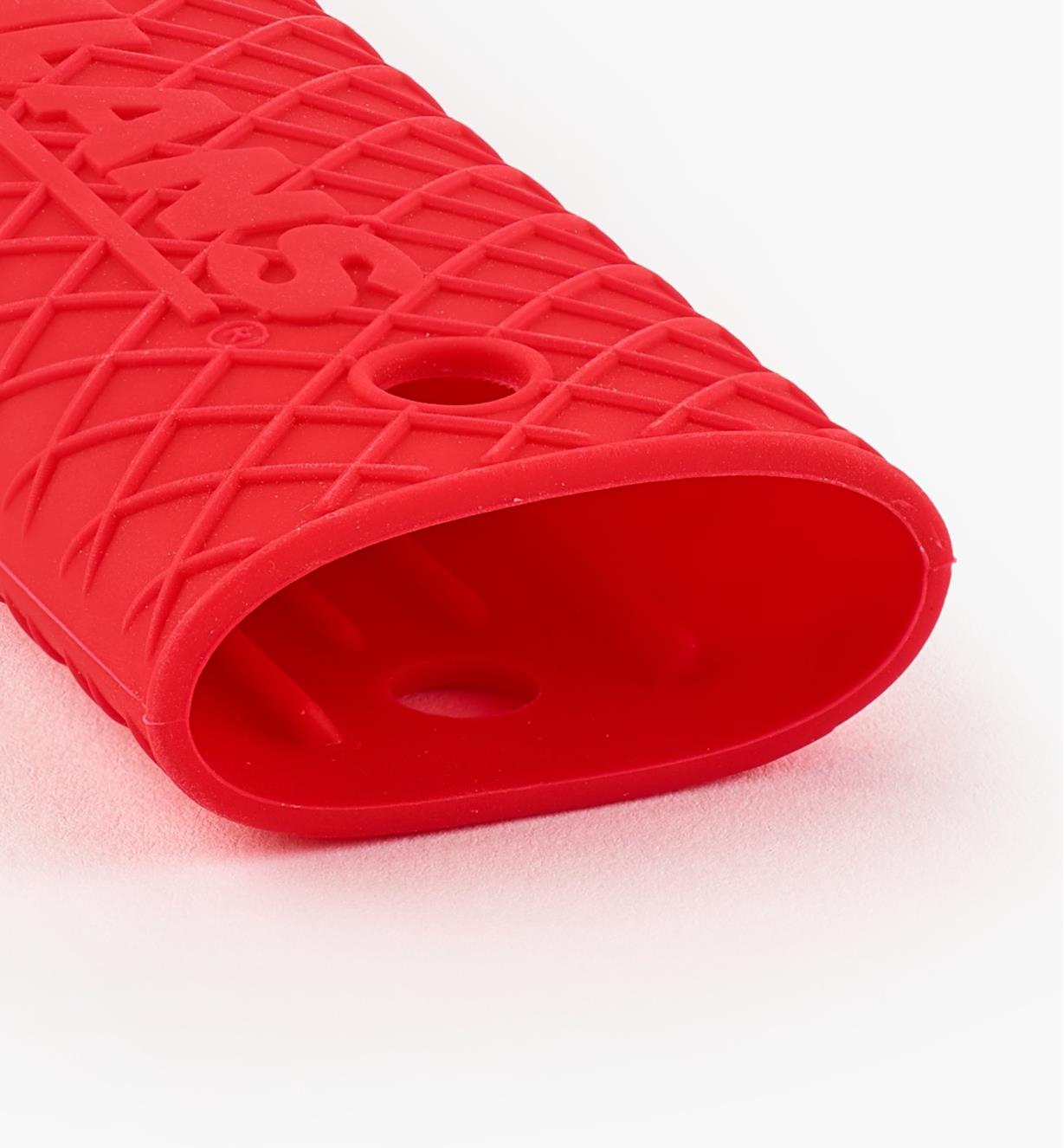 Detail of exterior grip texture and interior ridges of silicone cast-iron handle grip