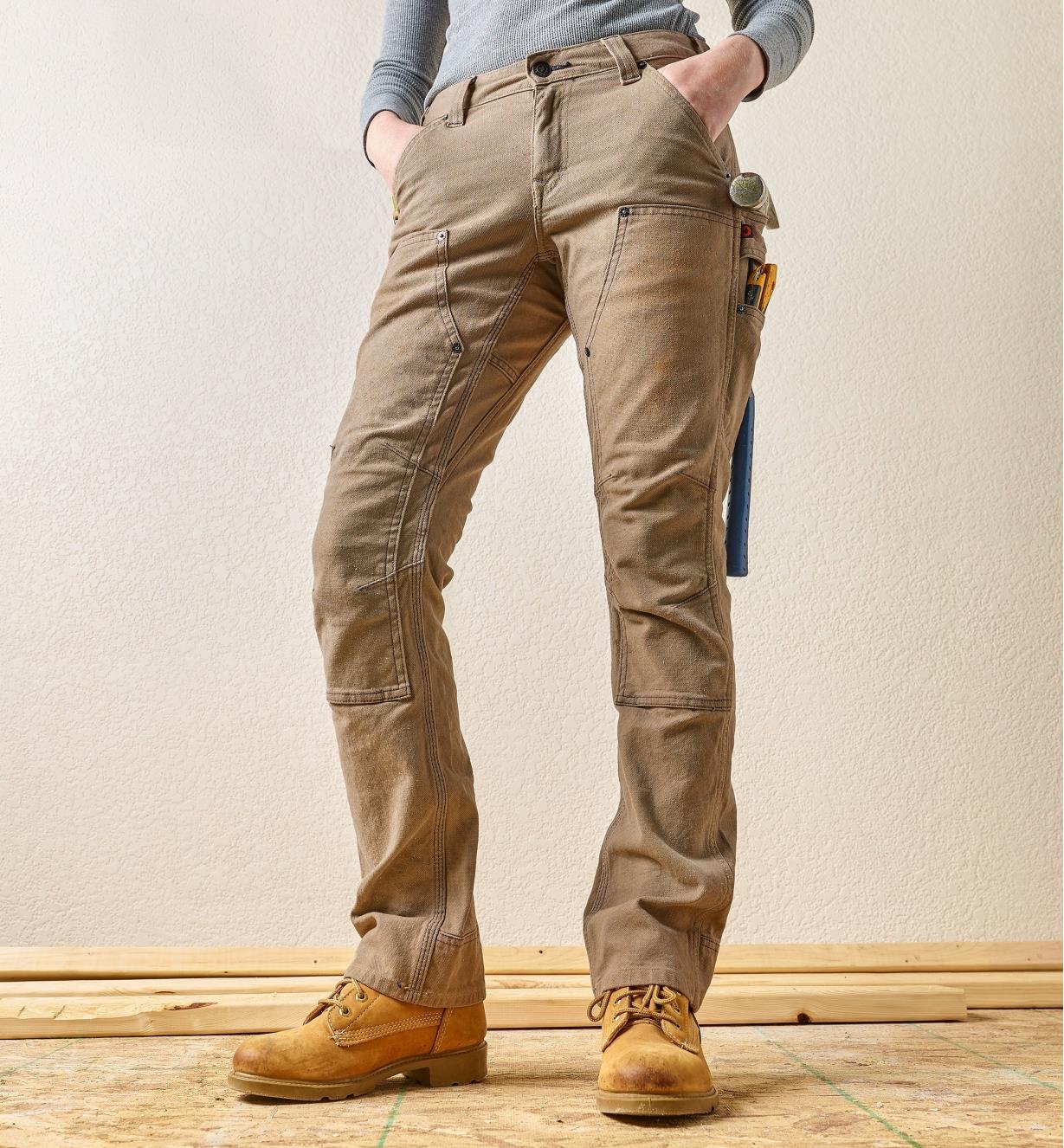 Front view of a woman wearing Dovetail work pants